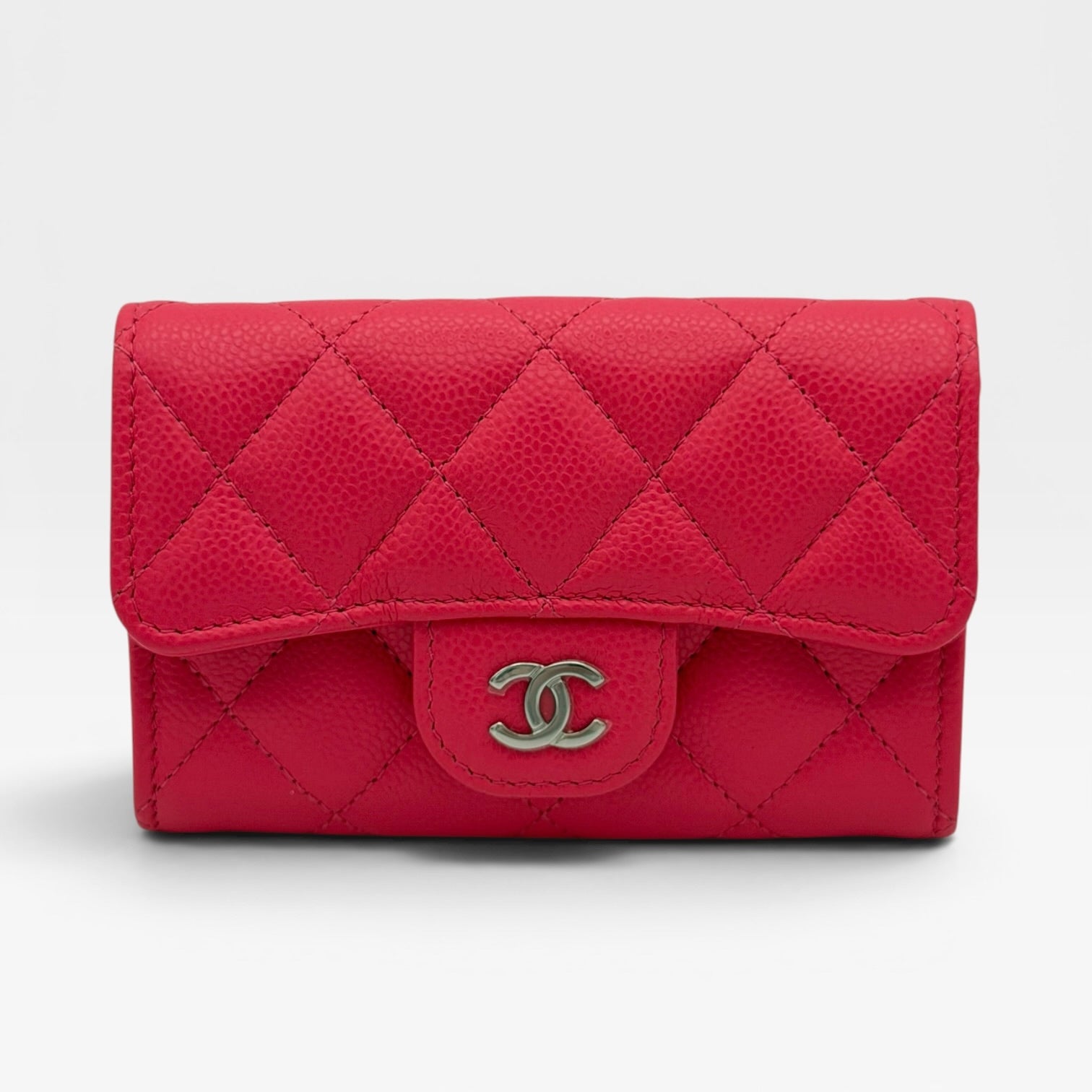 Chanel Classic Card Holder In Hot Pink Caviar Leather With Silver Hardware. Authentic and preloved in excellent condition
