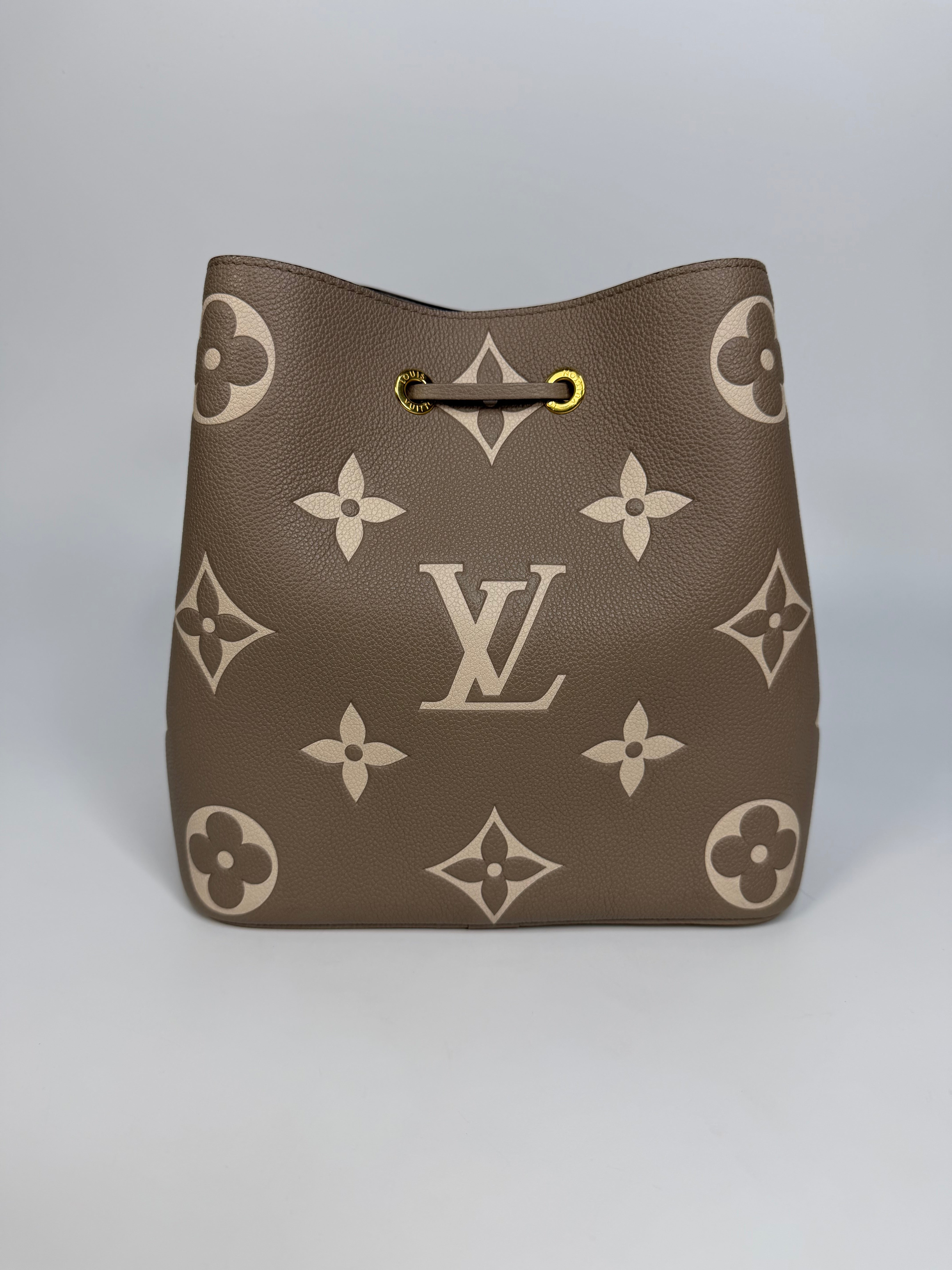 Louis Vuitton NéoNóe Bucket Bag MM Bi Colour Empereinte. Authentic and preloved in excellent condition.