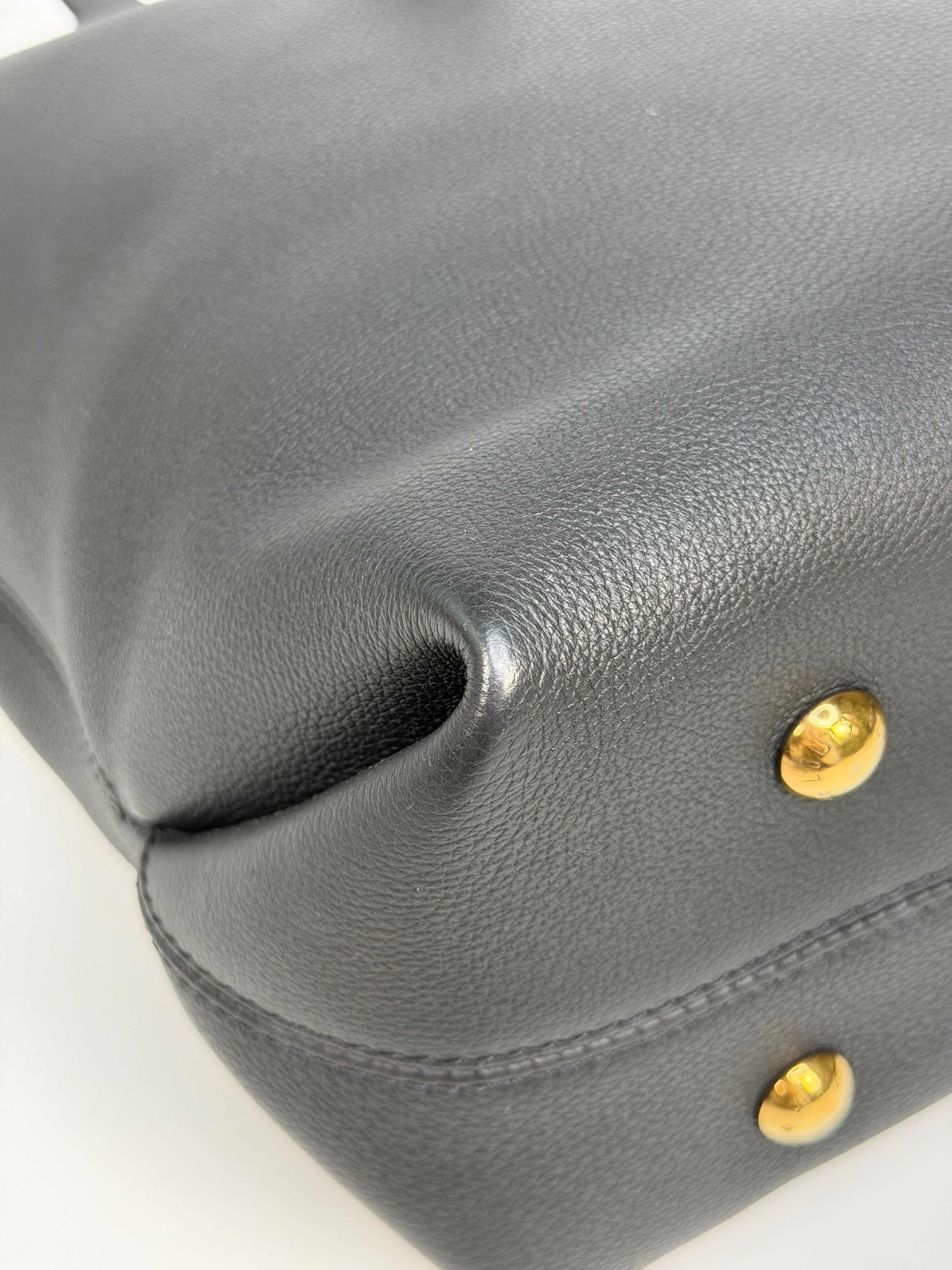 Louis Vuitton Low Key Cabas MM In Black Calfskin With Gold Hardware. Authentic and preloved in excellent condition
