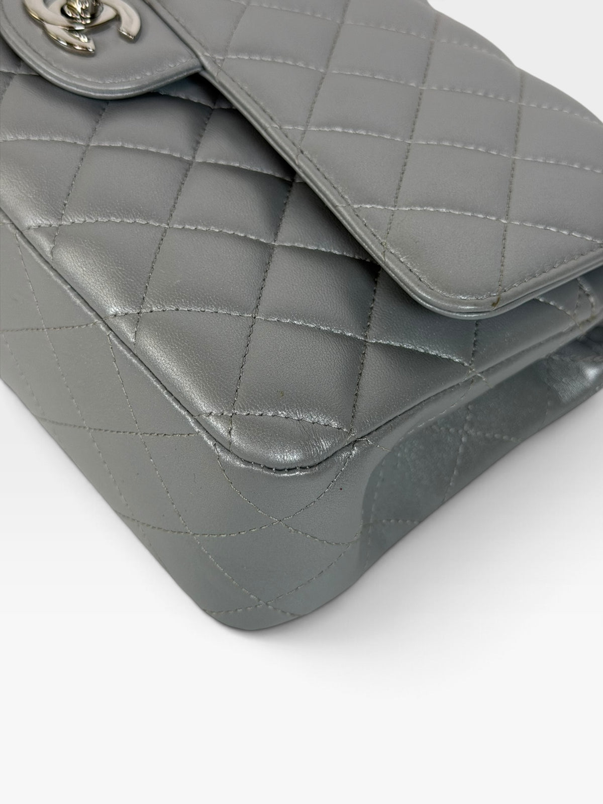 Chanel Medium Classic Double Flap In Silver Lambskin Leather Silver Hardware. 100% authentic and preloved in excellent condition