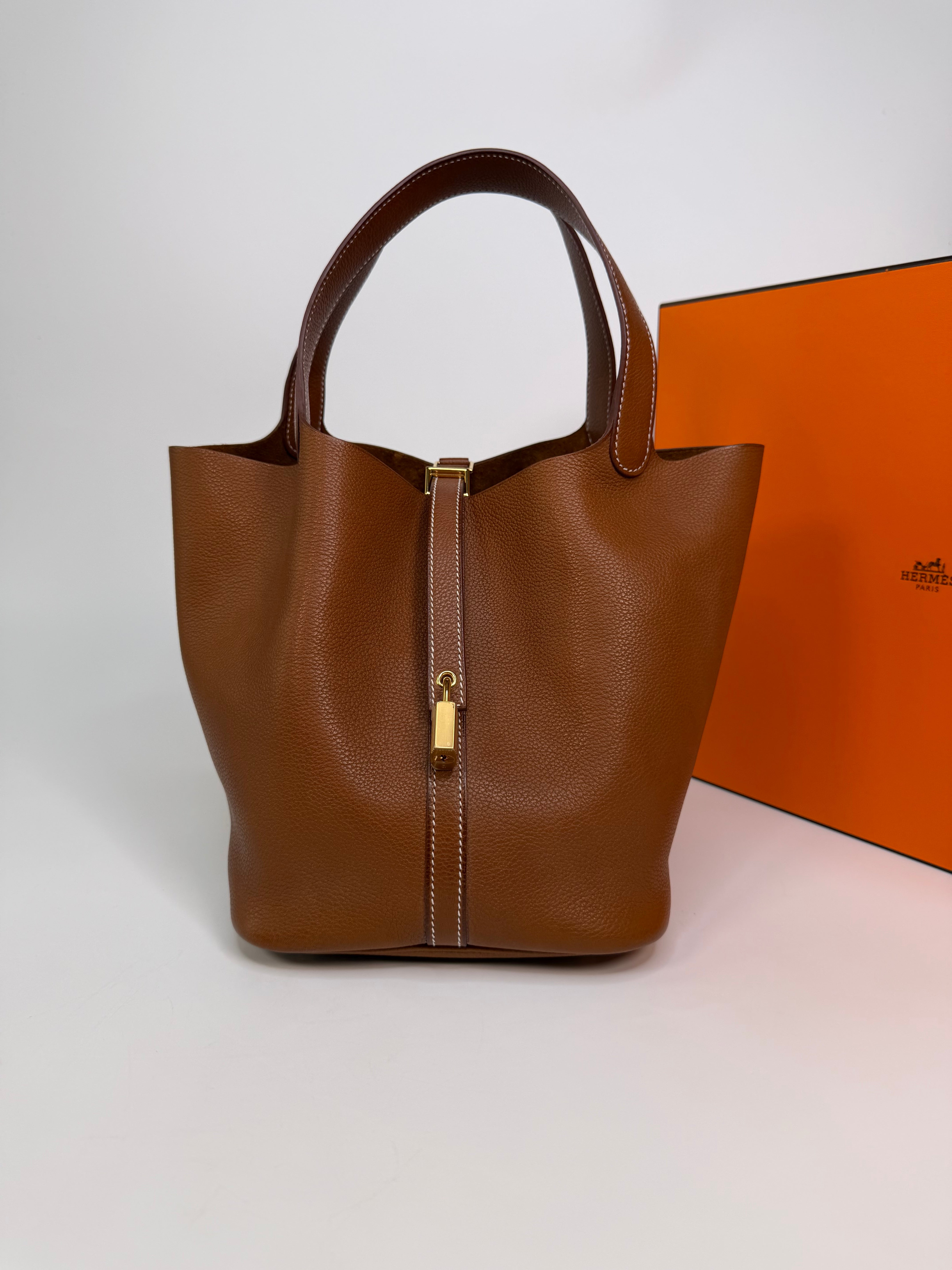 Hermès Picotin 22 In Gold Barenia Fauboug Leather With Gold Hardware. Authentic and preloved in excellent condition