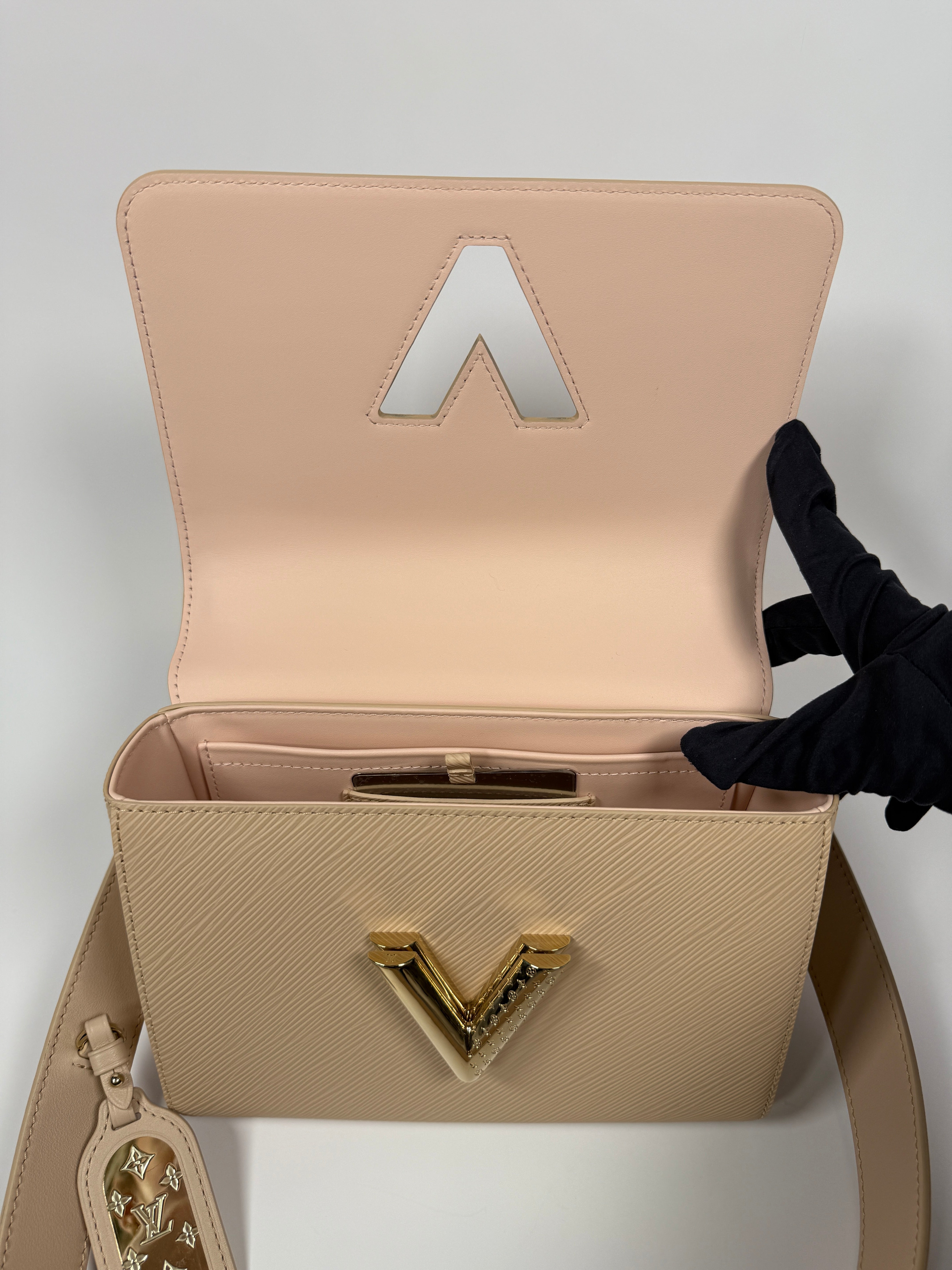 Louis Vuitton Twist MM Bag In Blush Pink Epi Leather