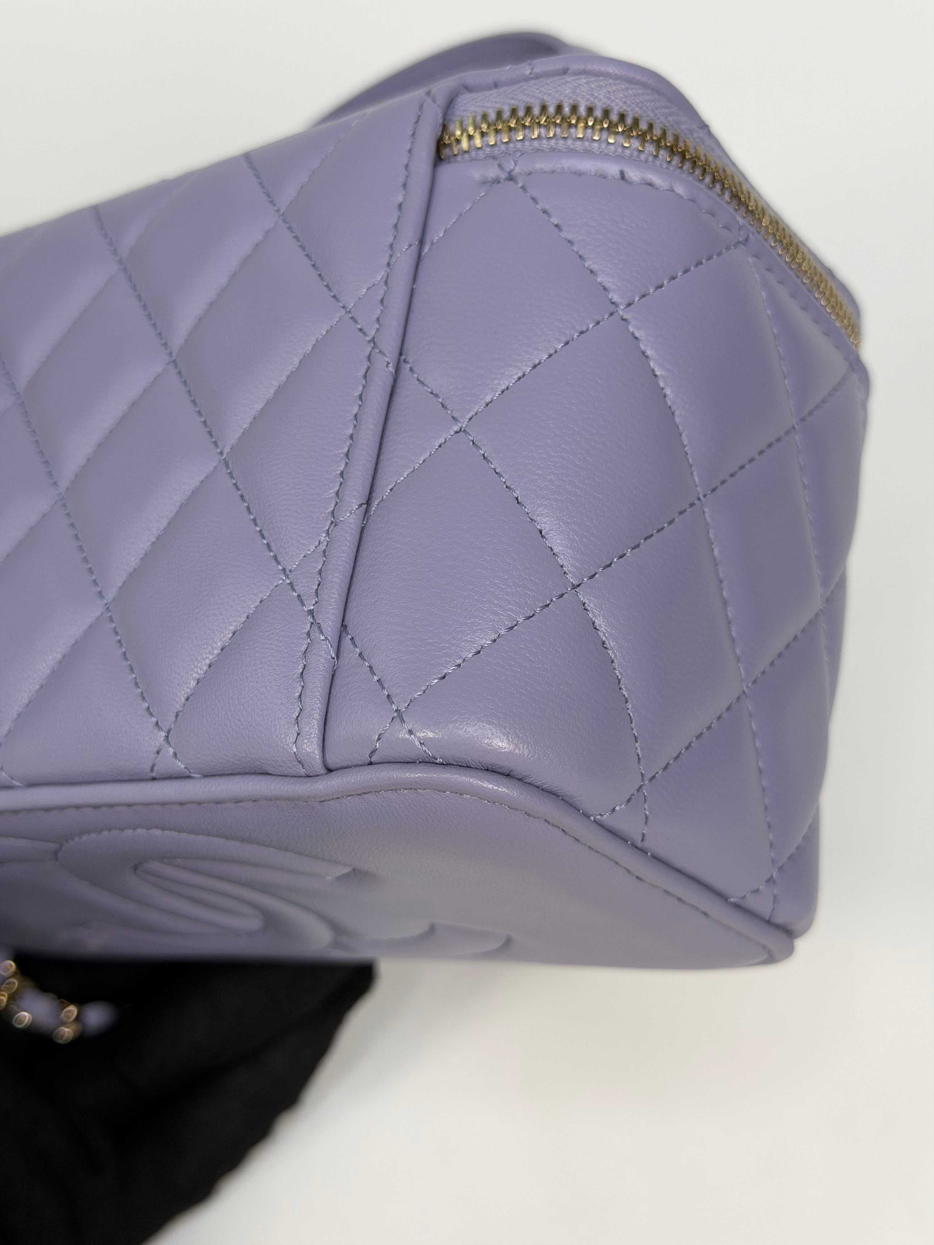 Chanel Mini Vanity Top Handle In Lilac Lambskin Leather With Gold Hardware. Authentic and preloved in excellent condition