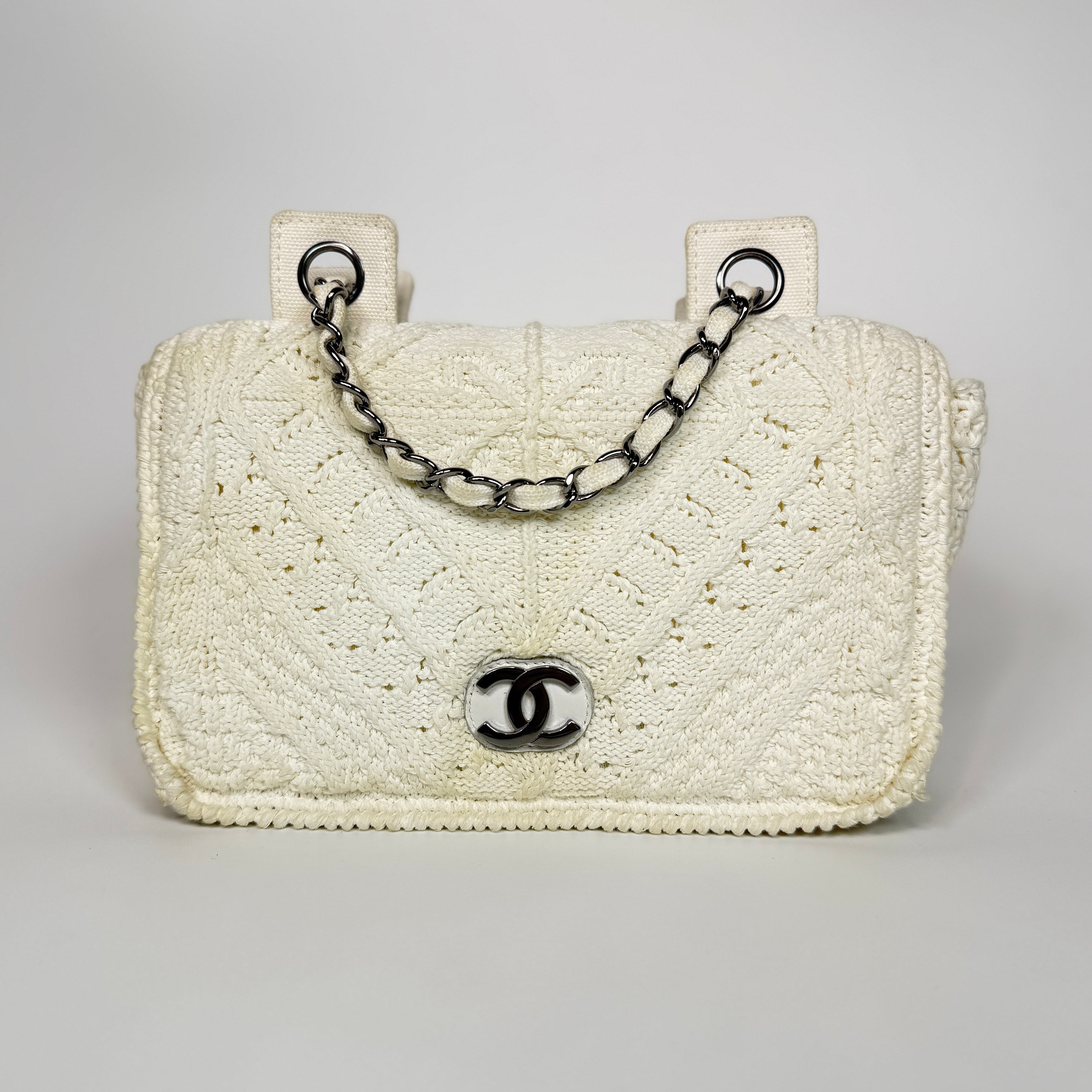 Authentic and preloved Chanel Vintage White Crotchet Flap Bag With Silver hardware. Good condition. 100% Authenticity guarantee
