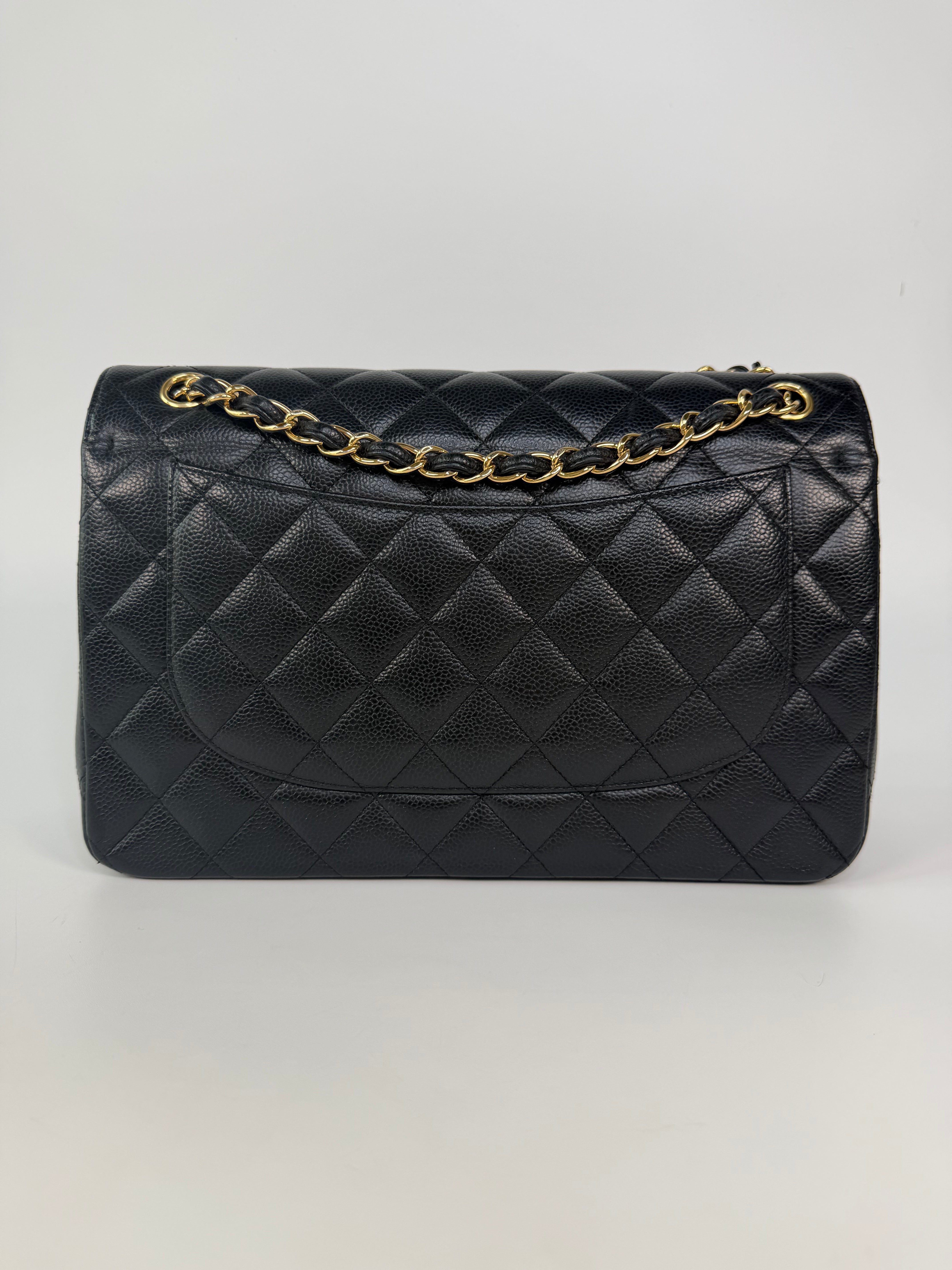 Chanel Jumbo Classic Flap Bag In Black Caviar Leather With Gold Hardware 100% authentic and preloved in excellent condition