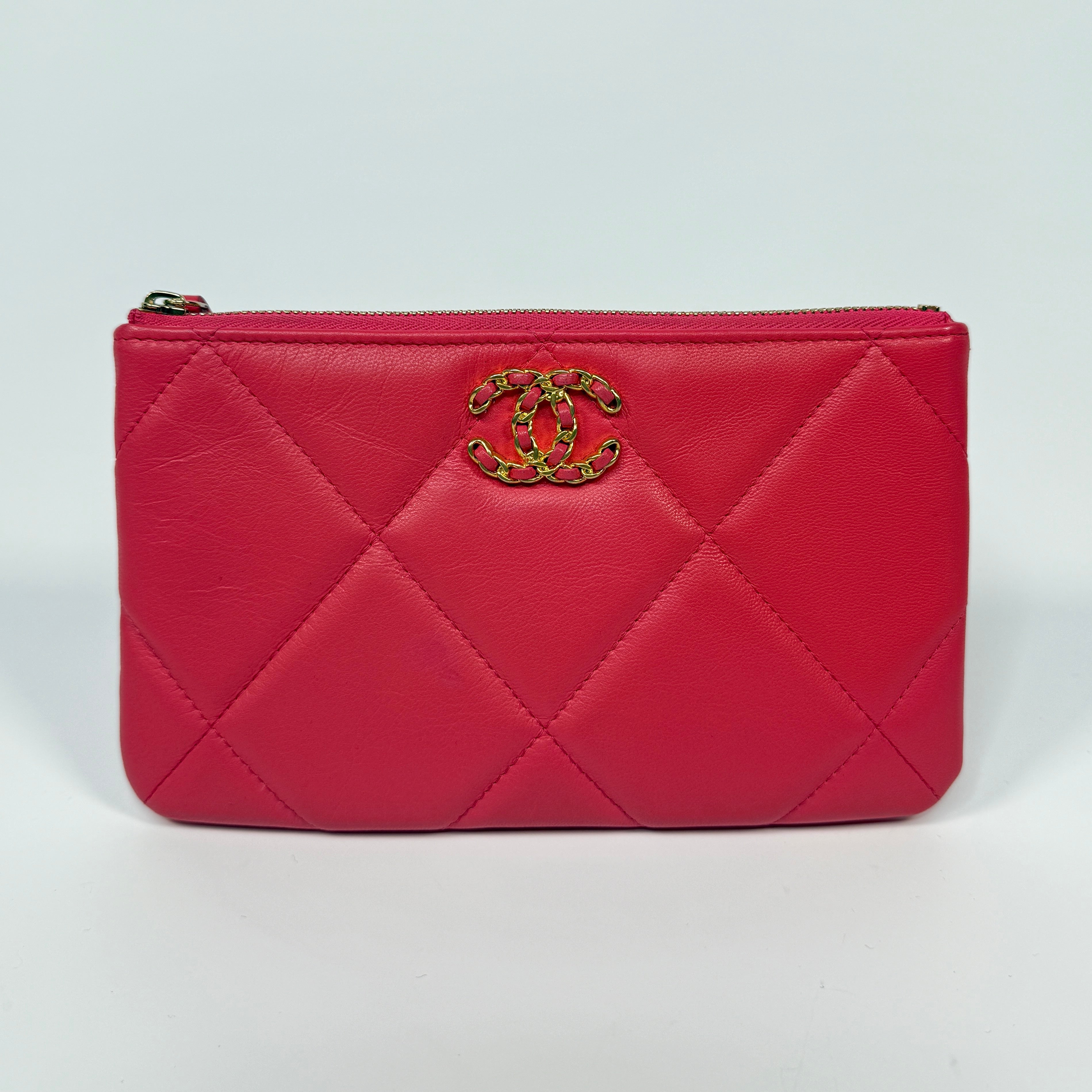 Chanel 19 Zip Pouch In Pink Calfskin Leather With Gold Hardware. Authentic preloved condition.
