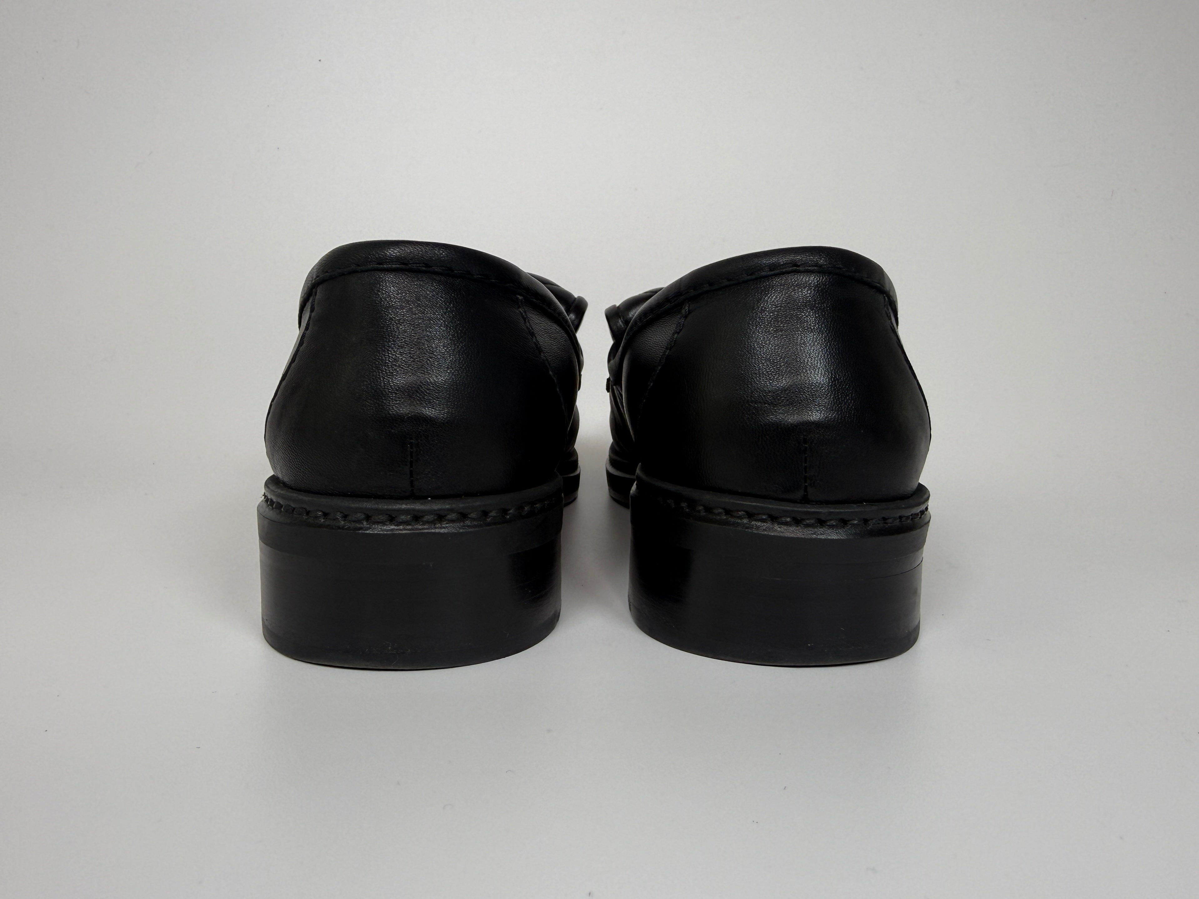 Authentic and preloved Chanel Black Quilted Leather Turnlock Loafers (Size 39/UK6) Excellent condition. 100% Authenticity guarantee