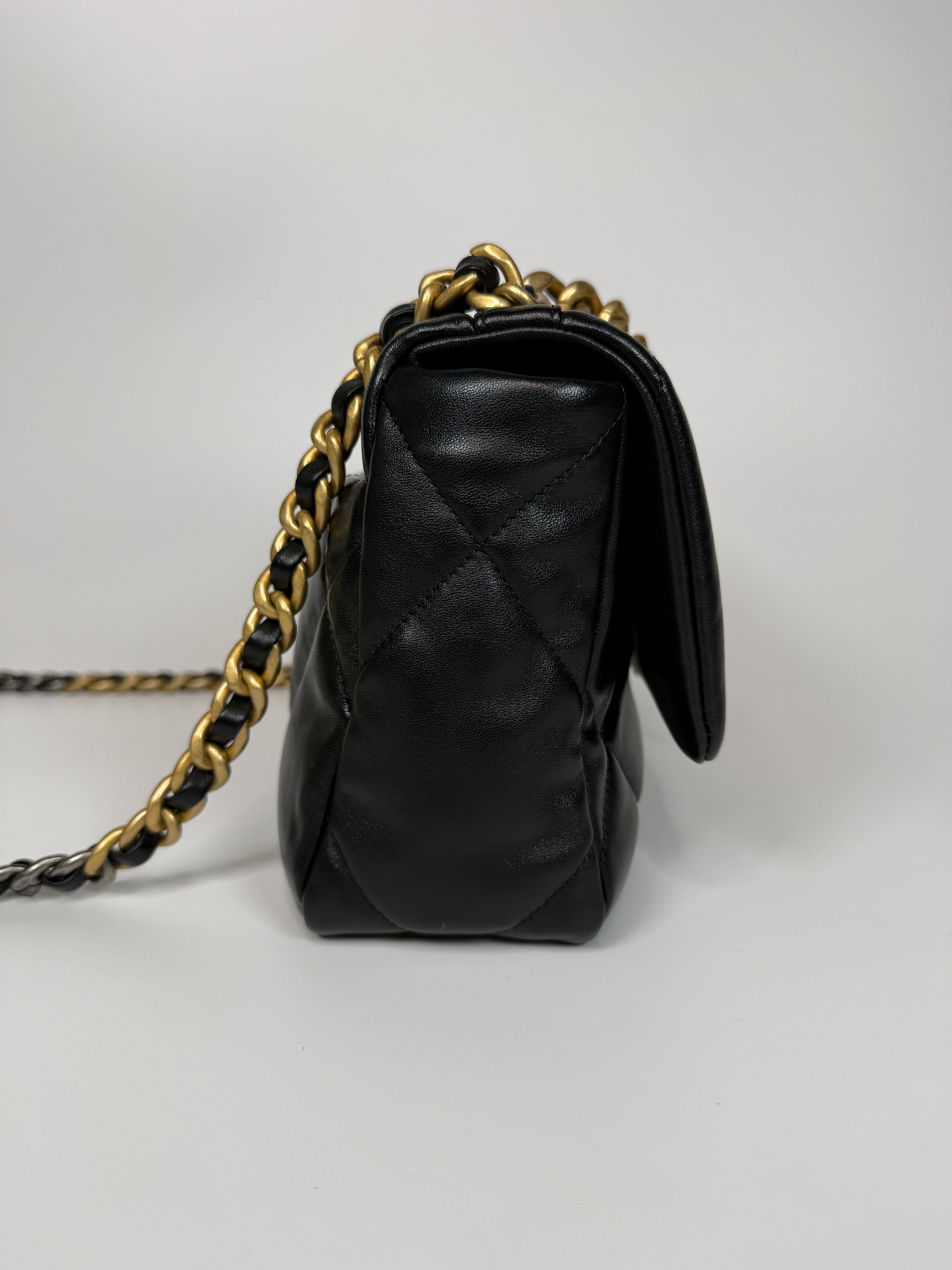 Authentic and preloved Chanel 19 Small In Black Lambskin Leather Mixed hardware. Excellent condition. 100% Authenticity guarantee