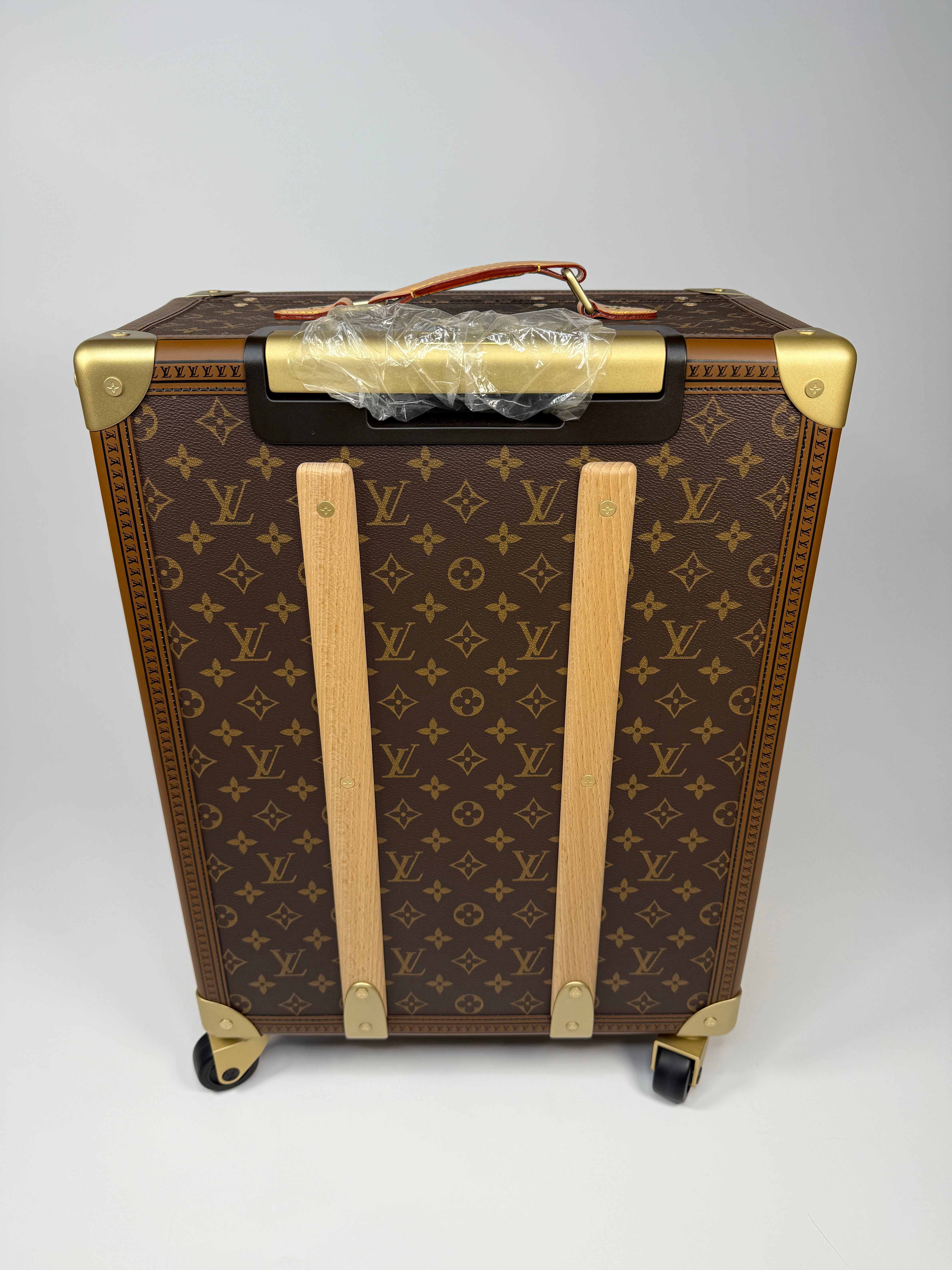 Louis Vuitton Monogram Trunk Roller authentic and preloved in new and unused condition