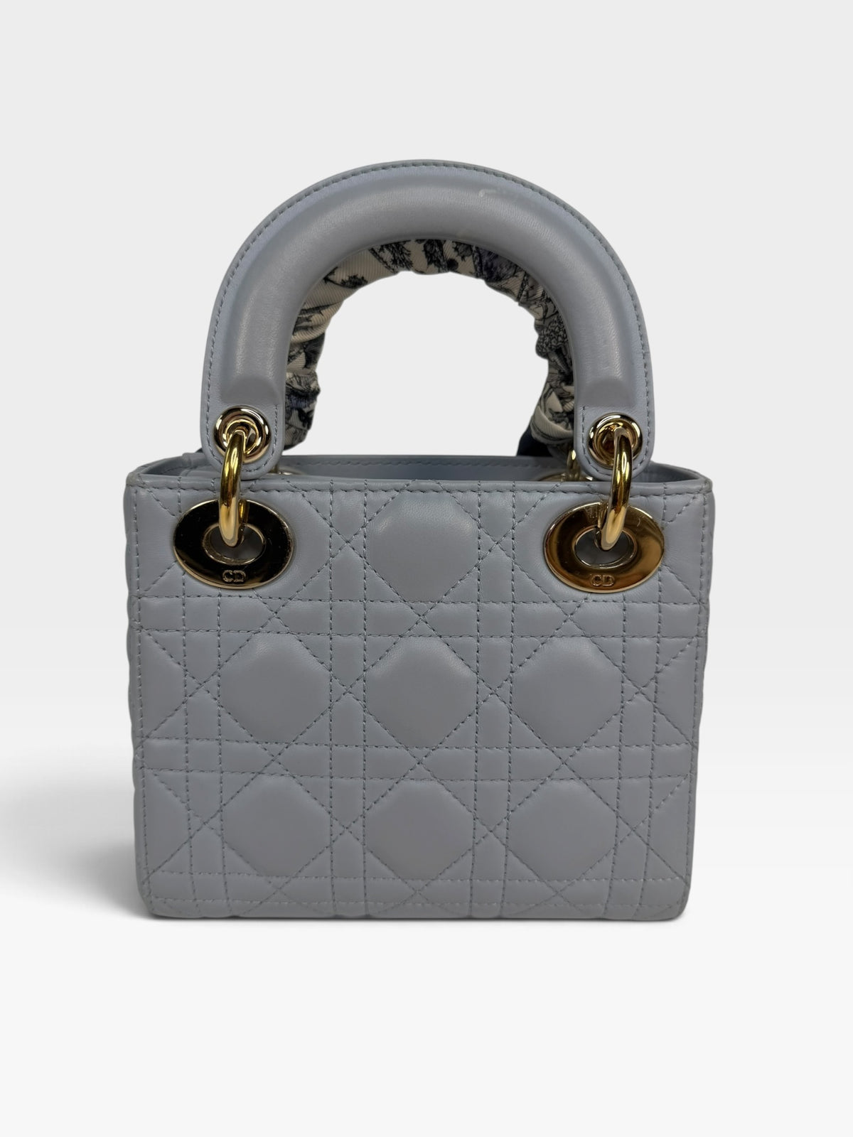 Christian Dior Mini Lady Dior In Pale Blue Cannage Leather With Pale Gold Hardware. 100% Authentic and Preloved in excellent condition. 100% Guarantee