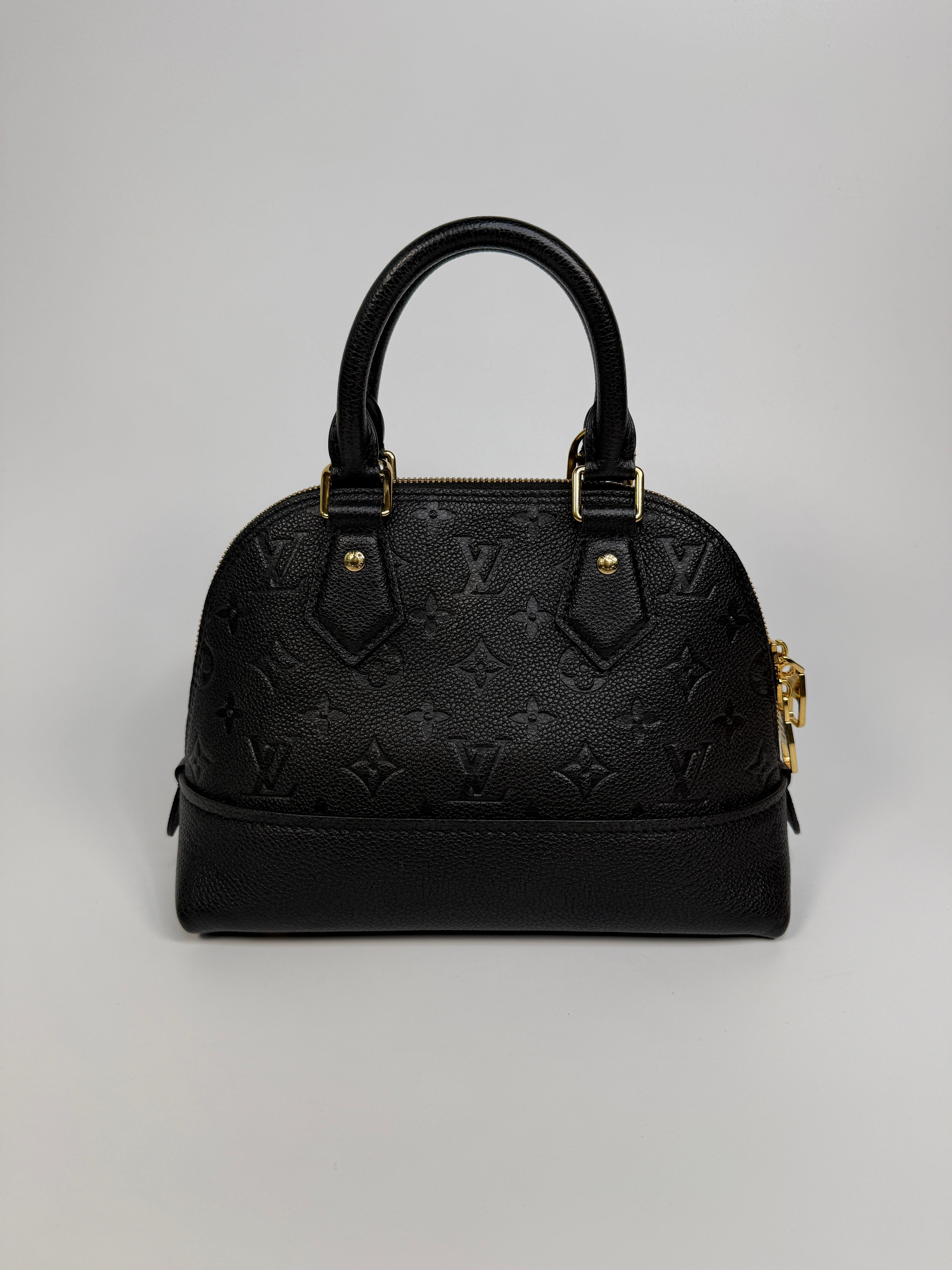 Authentic and preloved Louis Vuitton Alma BB In Empreinte Black Monogram With Gold Hardware