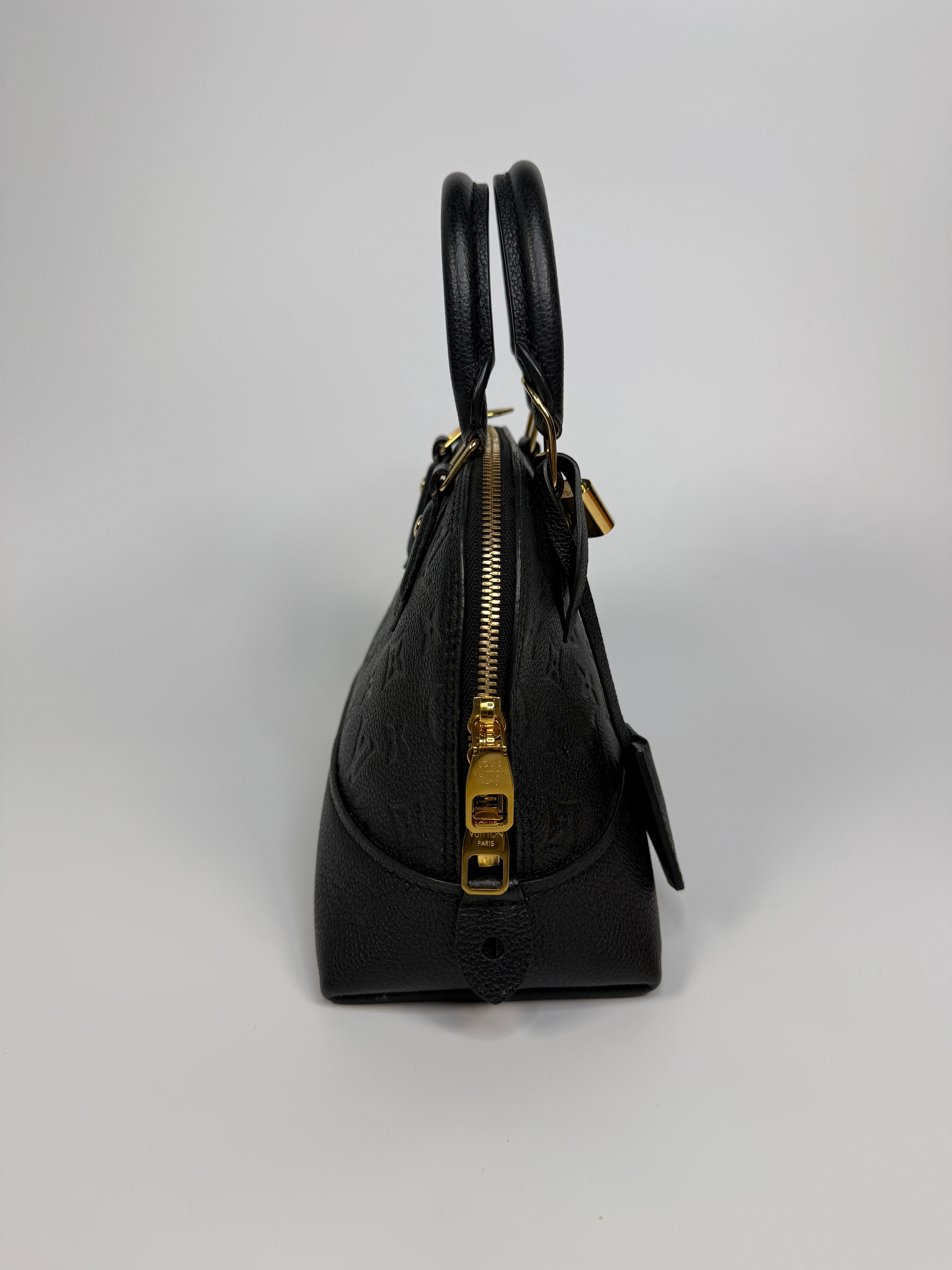 Authentic and preloved Louis Vuitton Alma BB In Empreinte Black Monogram With Gold Hardware
