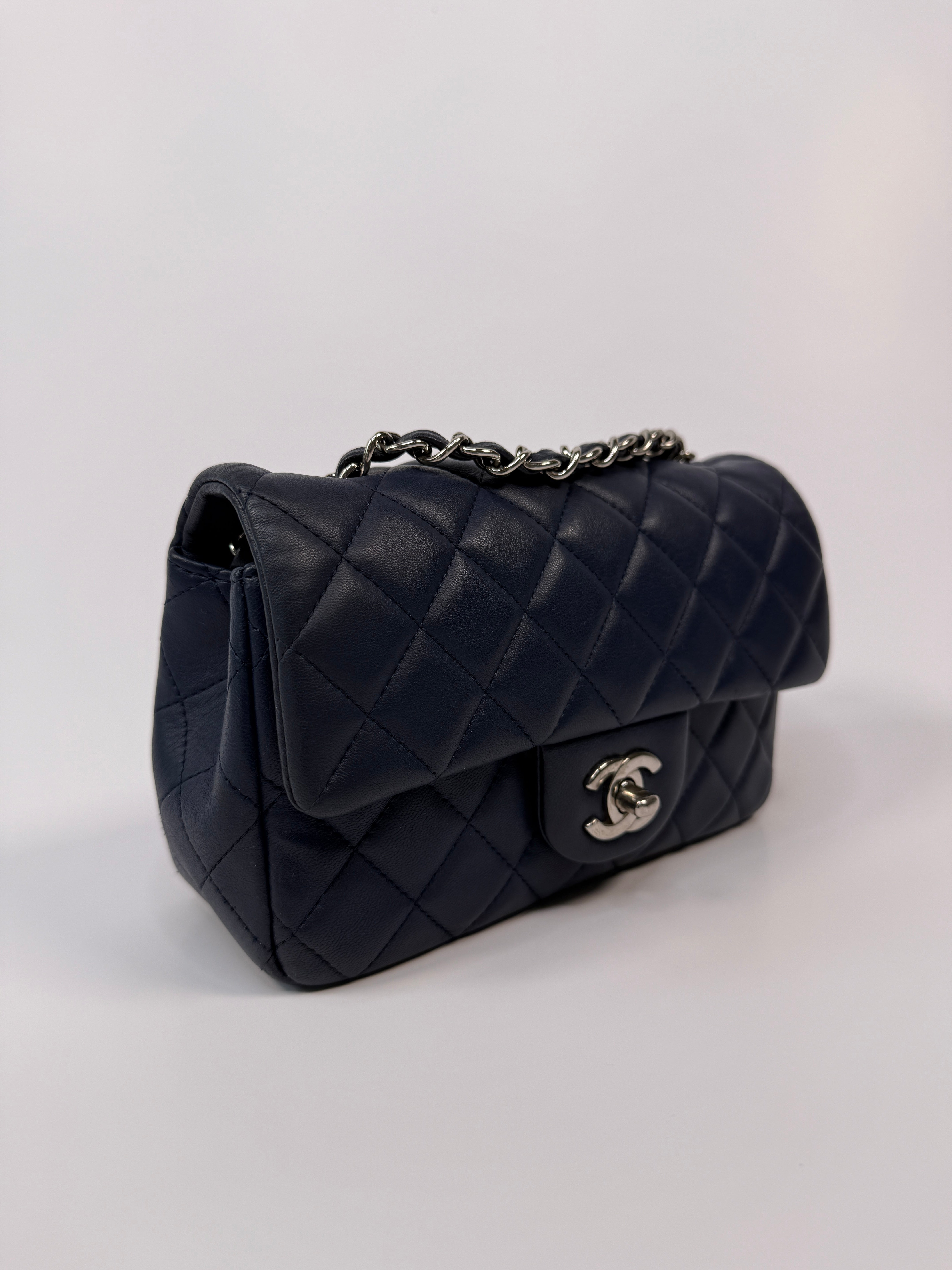 Chanel Mini Rectangle Flap Bag In Navy Lambskin With Silver Hardware
Pre Loved & Authentic