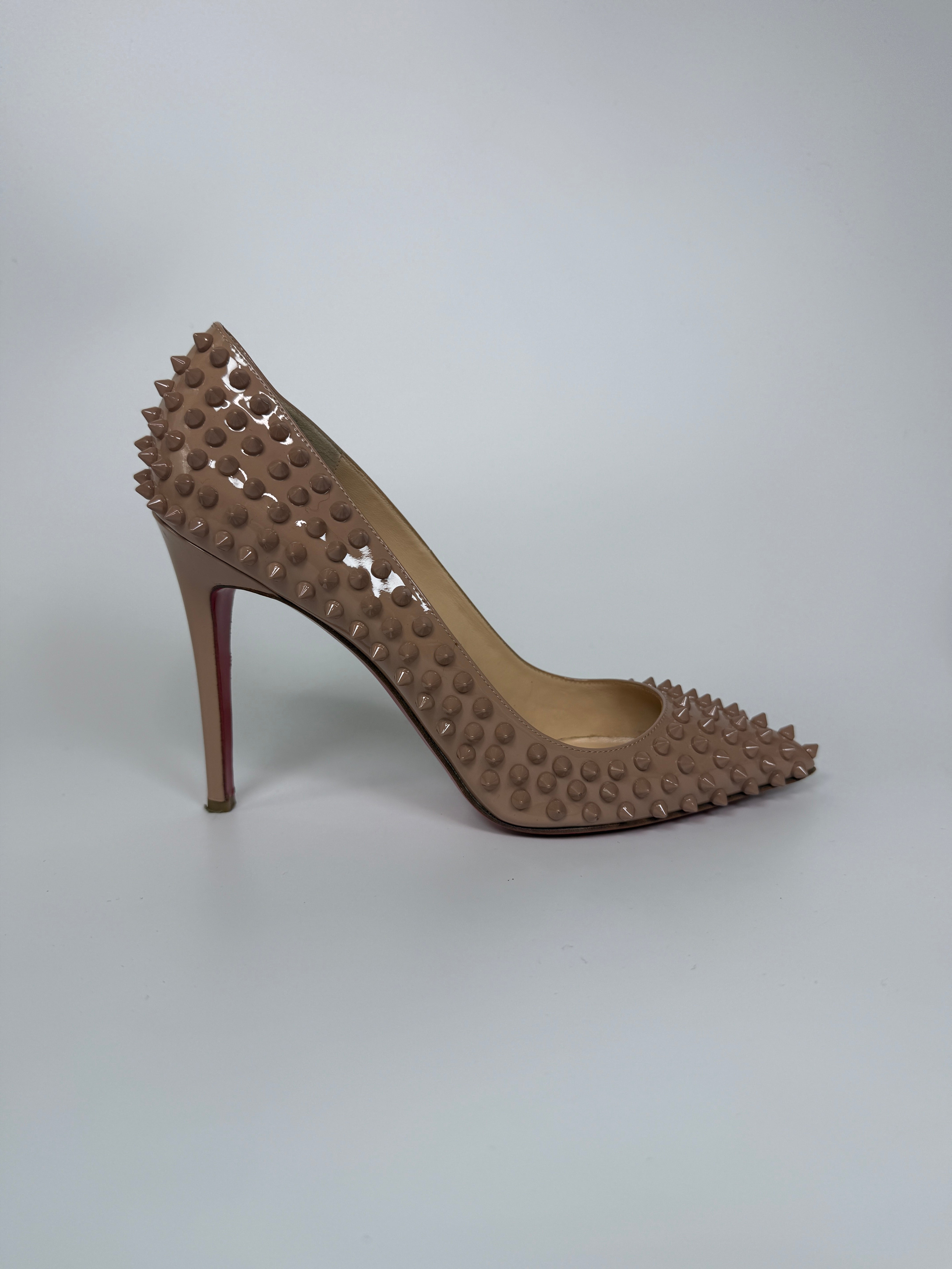 Authentic and preloved Christian Louboutin Nude Spike Pigalle 100 Heels (Size 41.5/UK8.5) Very Good condition. 100% Authenticity Guarantee