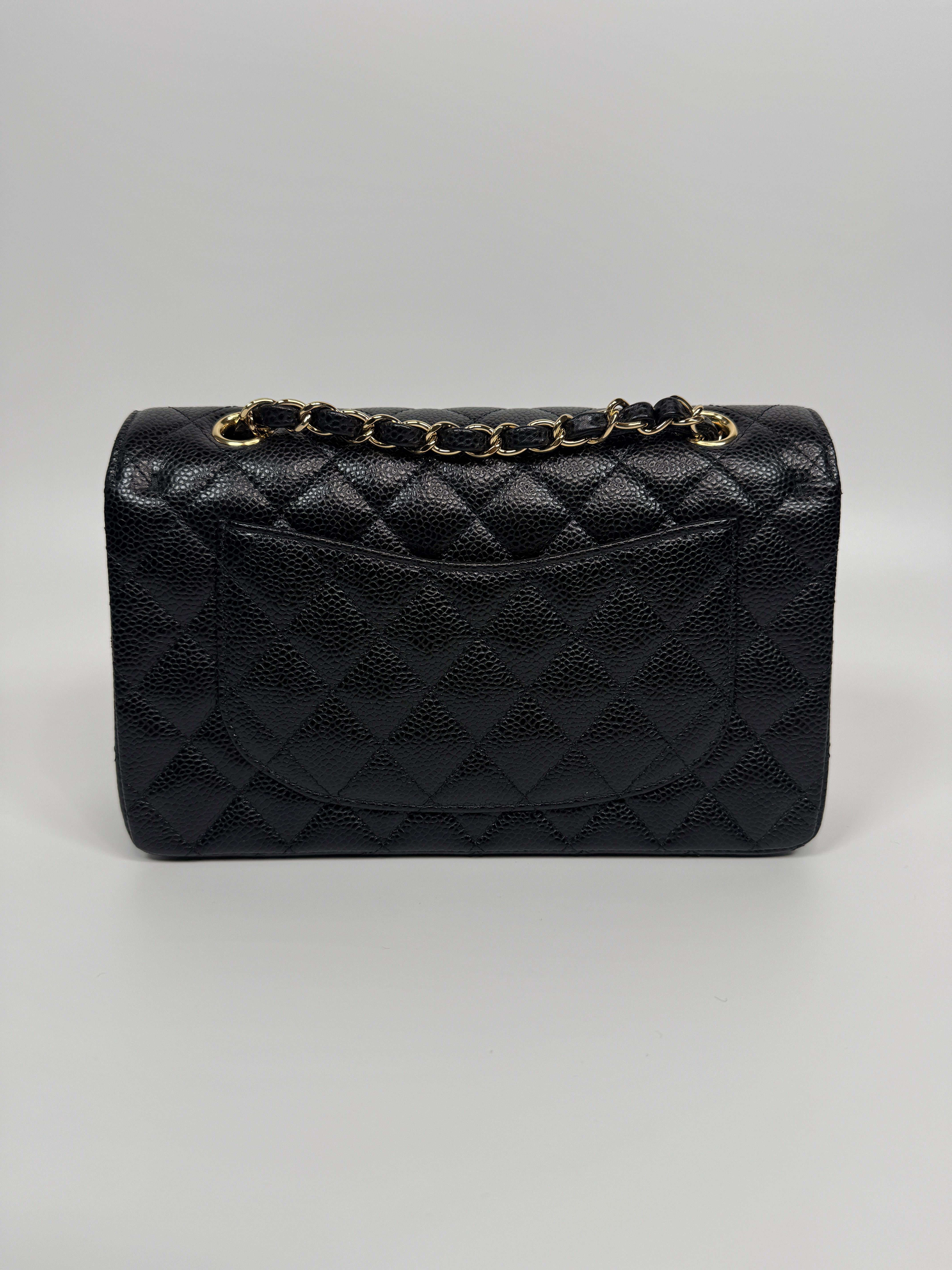 Chanel Small Classic Double Flap In Black Caviar Leather With Gold Hardware Authentic and Preloved In Excellent Condition. 100% Authenticity guarantee