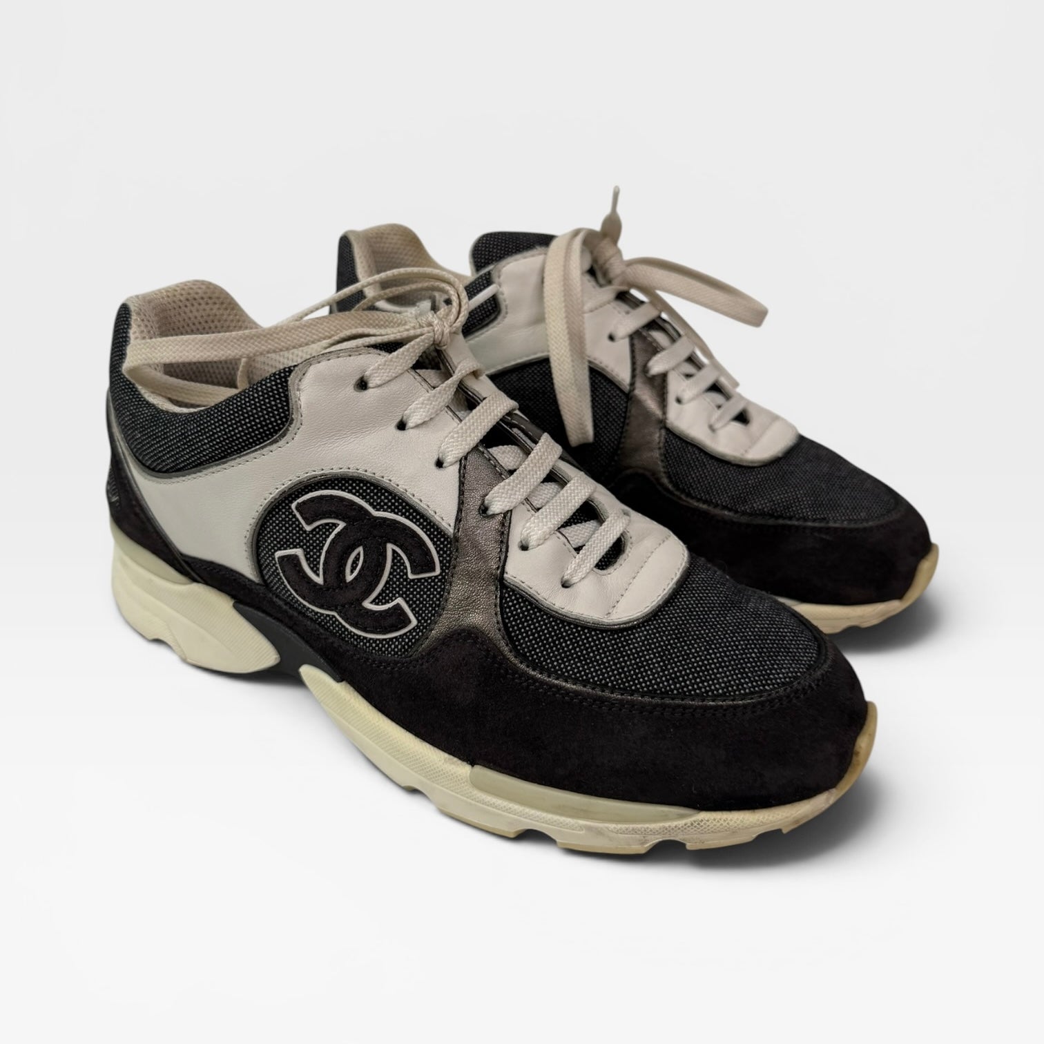 Chanel CC Sneakers In Dark Grey, White & Silver (Size 36.5/UK3.5). 100% authentic and preloved in excellent condition.
