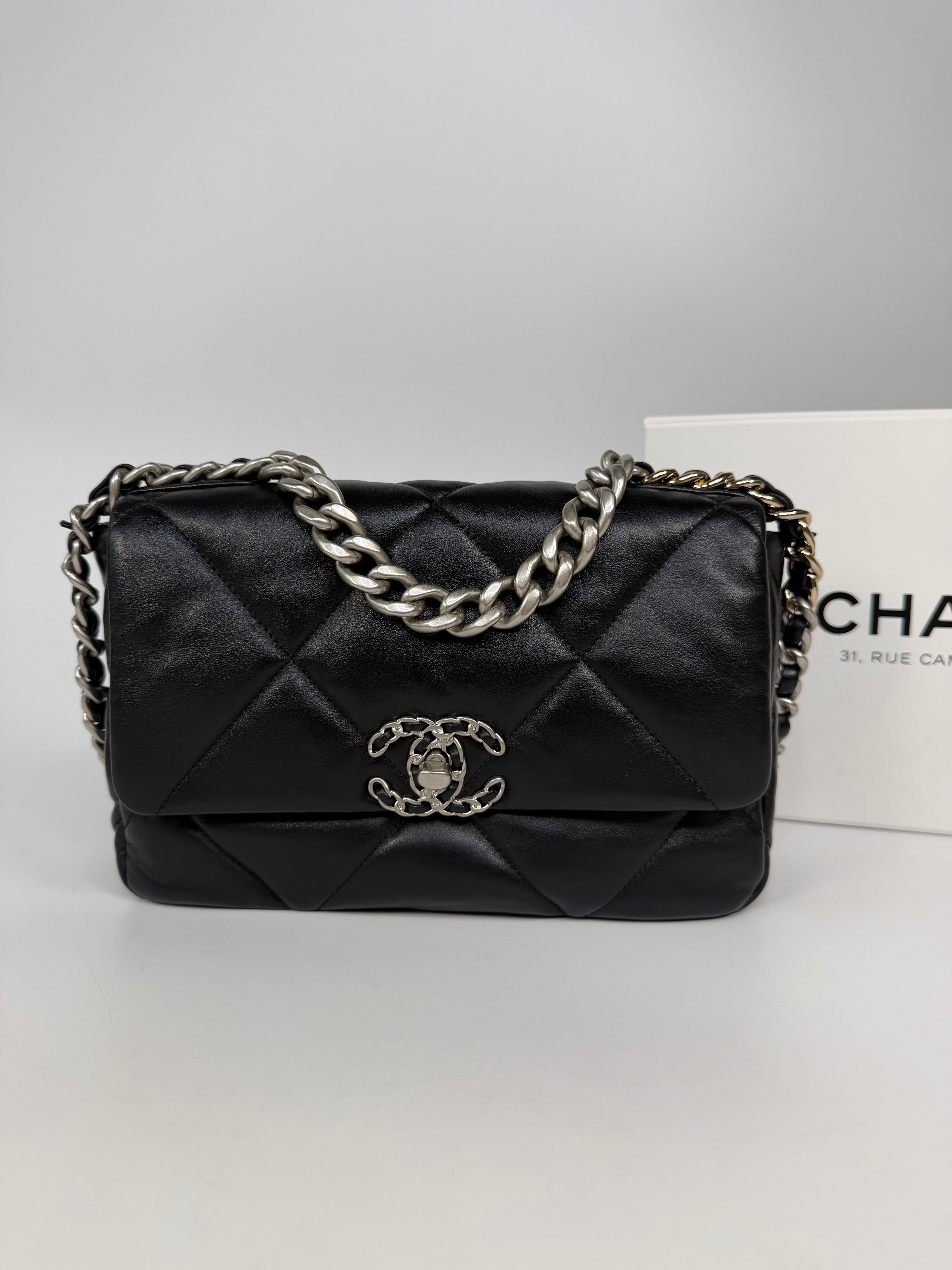 Chanel 19 Small In Black & White Leather With Mixed Hardware. Authentic and preloved in excellent condition. Verified by Luxe Cheshire.