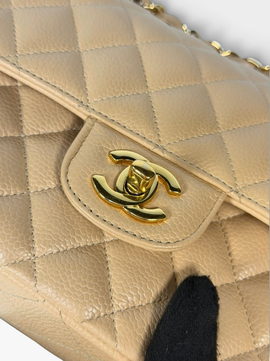 Chanel Small Classic Double Flap In Beige Caviar Leather With Gold Hardware. 100% authentic and preloved in excellent condition.
