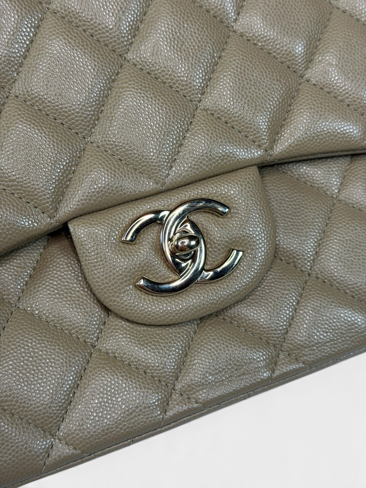 Chanel Maxi Flap In Beige Caviar Leather With Gold Hardware. 100% authentic and pre loved in excellent condition.
