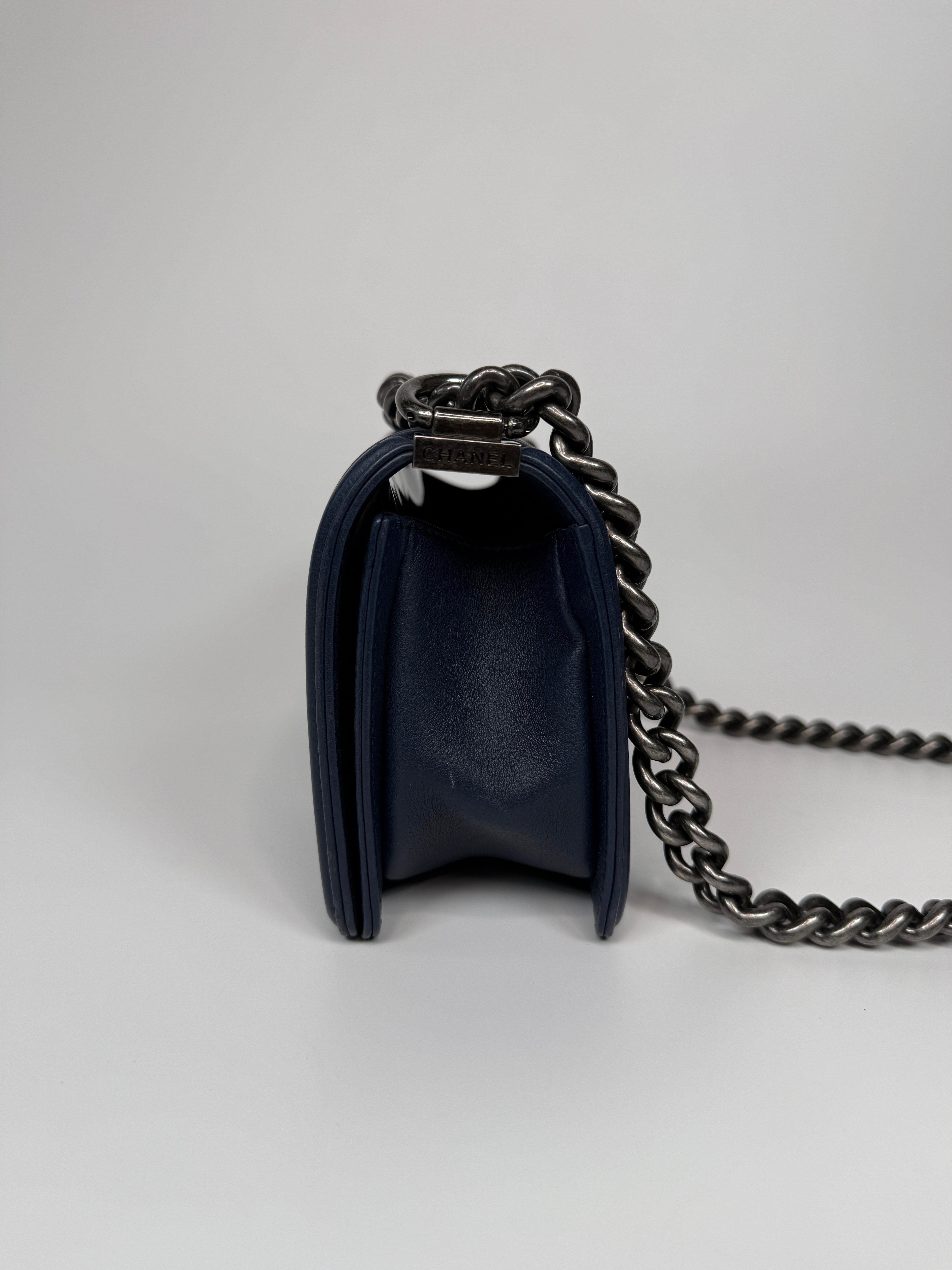 Chanel Mini Boy Bag In Navy Lambskin With Ruthenium Hardware In Excellent Condition.
Authentic Pre Loved Verified by Luxe Cheshire Trusted Designer resale