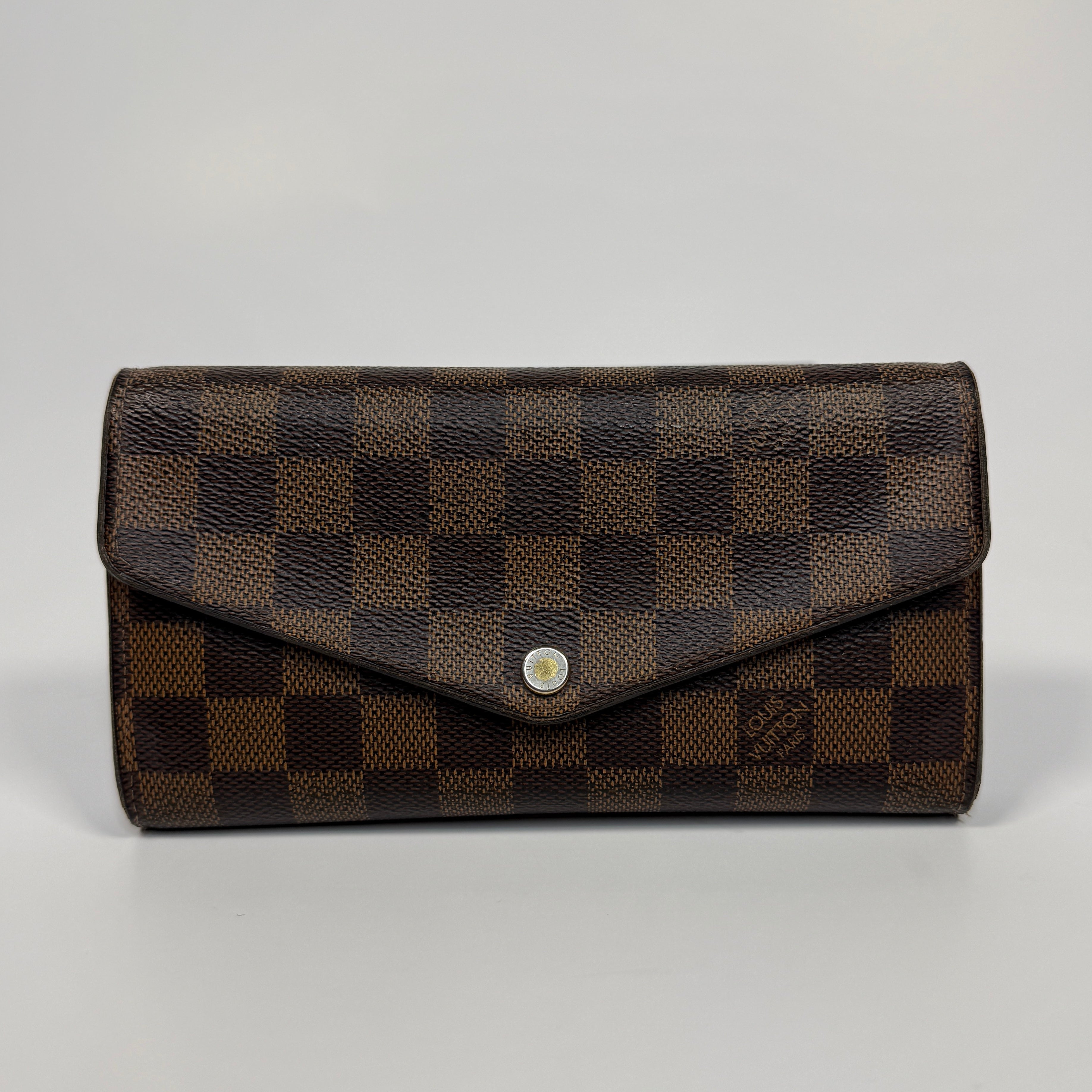 Authentic and preloved Louis Vuitton Sarah Wallet In a good condition verified by Luxe Cheshire
