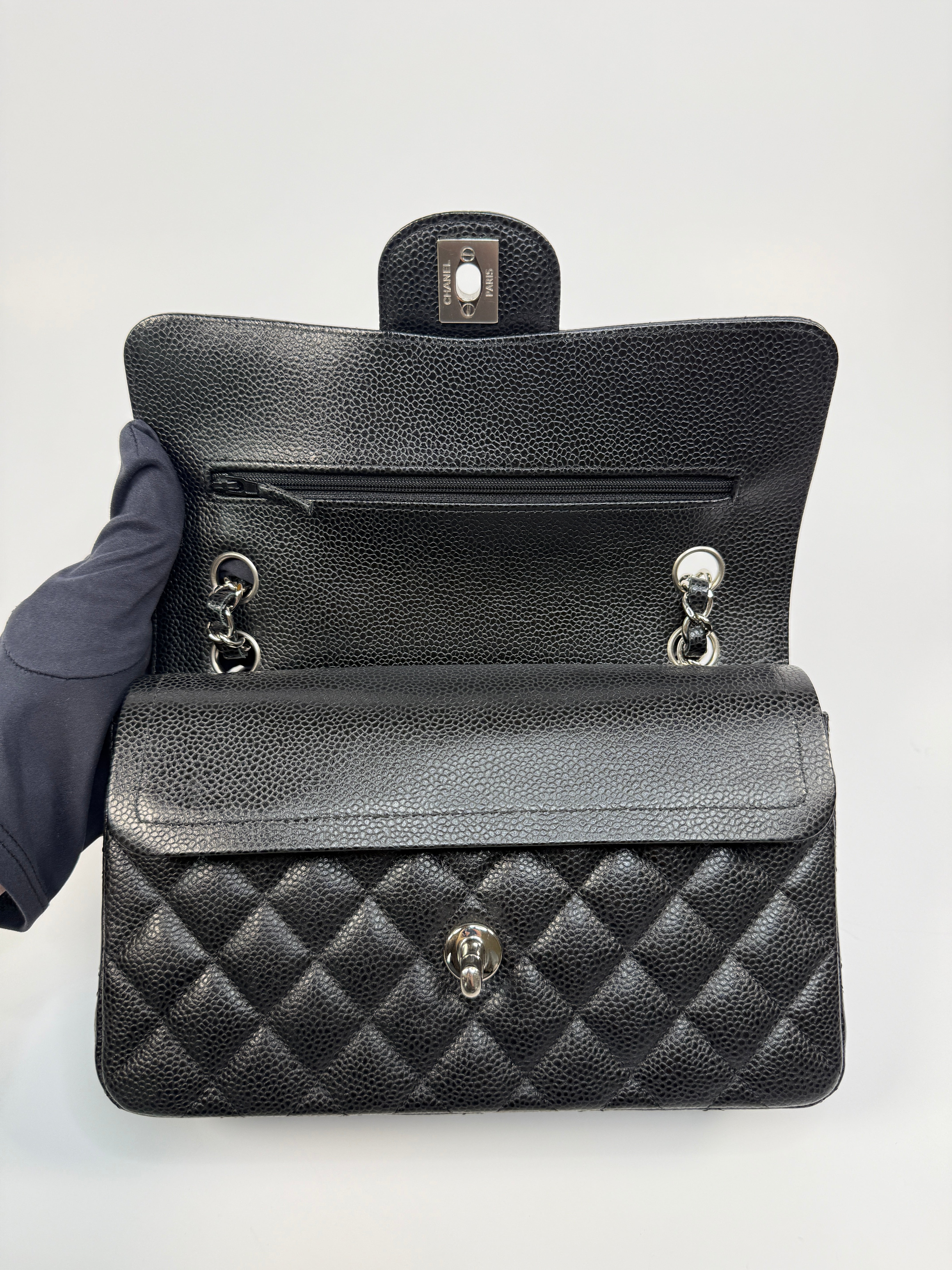 Chanel Small Classic Double Flap In Black Caviar Leather With Silver Hardware
Pre Loved & Authentic