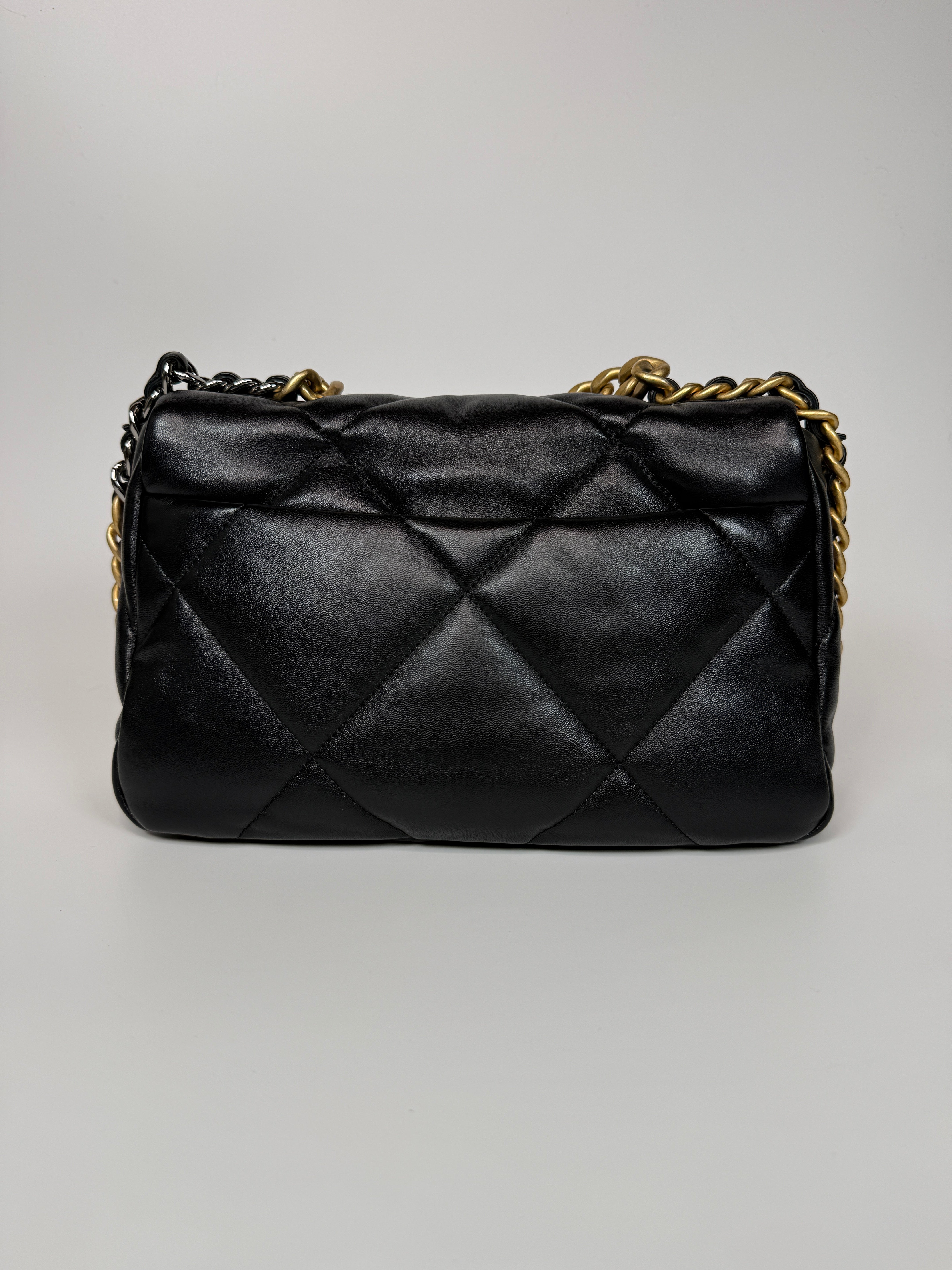 Authentic and preloved Chanel 19 Small In Black Lambskin Leather Mixed hardware. Excellent condition. 100% Authenticity guarantee