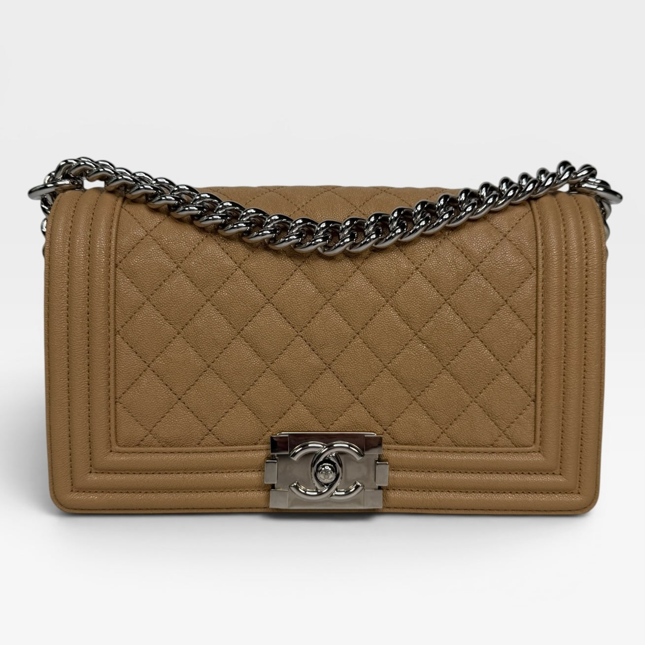 Chanel Medium Boy Bag Beige Caviar With Silver Hardware. Authentic and preloved in excellent condition