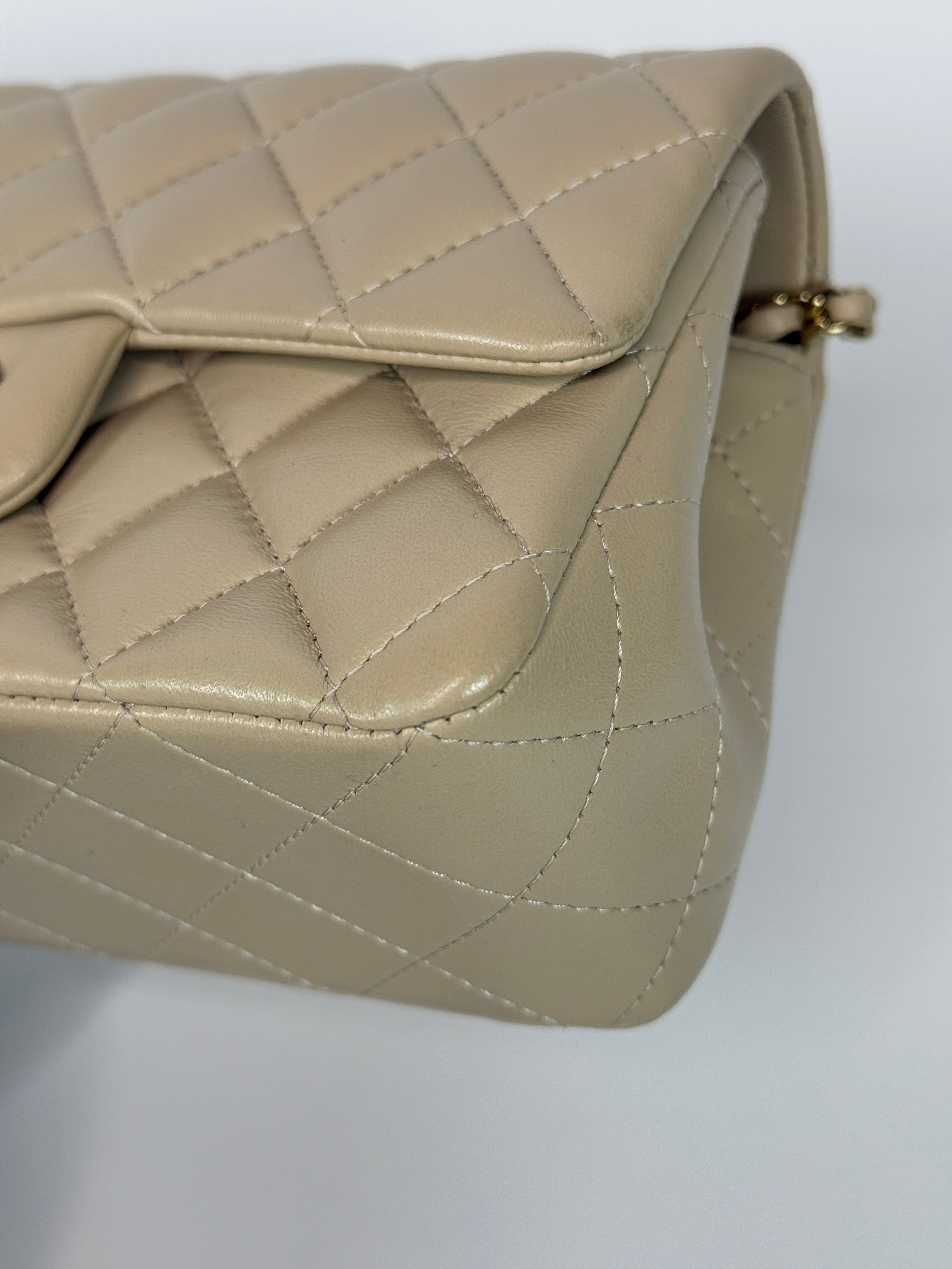 Authentic and preloved Chanel Mini Rectangle Top Handle In Ecru Lambskin With Gold Hardware in excellent condition, Fully insured next day delivery. Verified by Luxe Cheshire. 100% Authenticity guarantee,