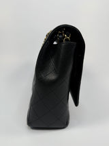 Chanel Maxi Classic Double Flap In Black Caviar Leather With GHW