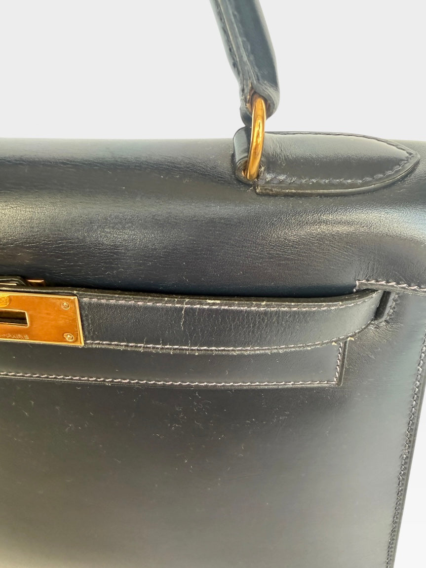 Hermès Vintage Kelly 28 In Navy Sellier Box Leather With Gold Hardware. 100% authentic and preloved in excellent condition.