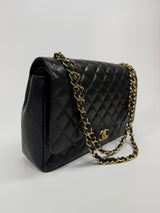 Chanel Maxi Classic Double Flap In Black Caviar Leather With GHW