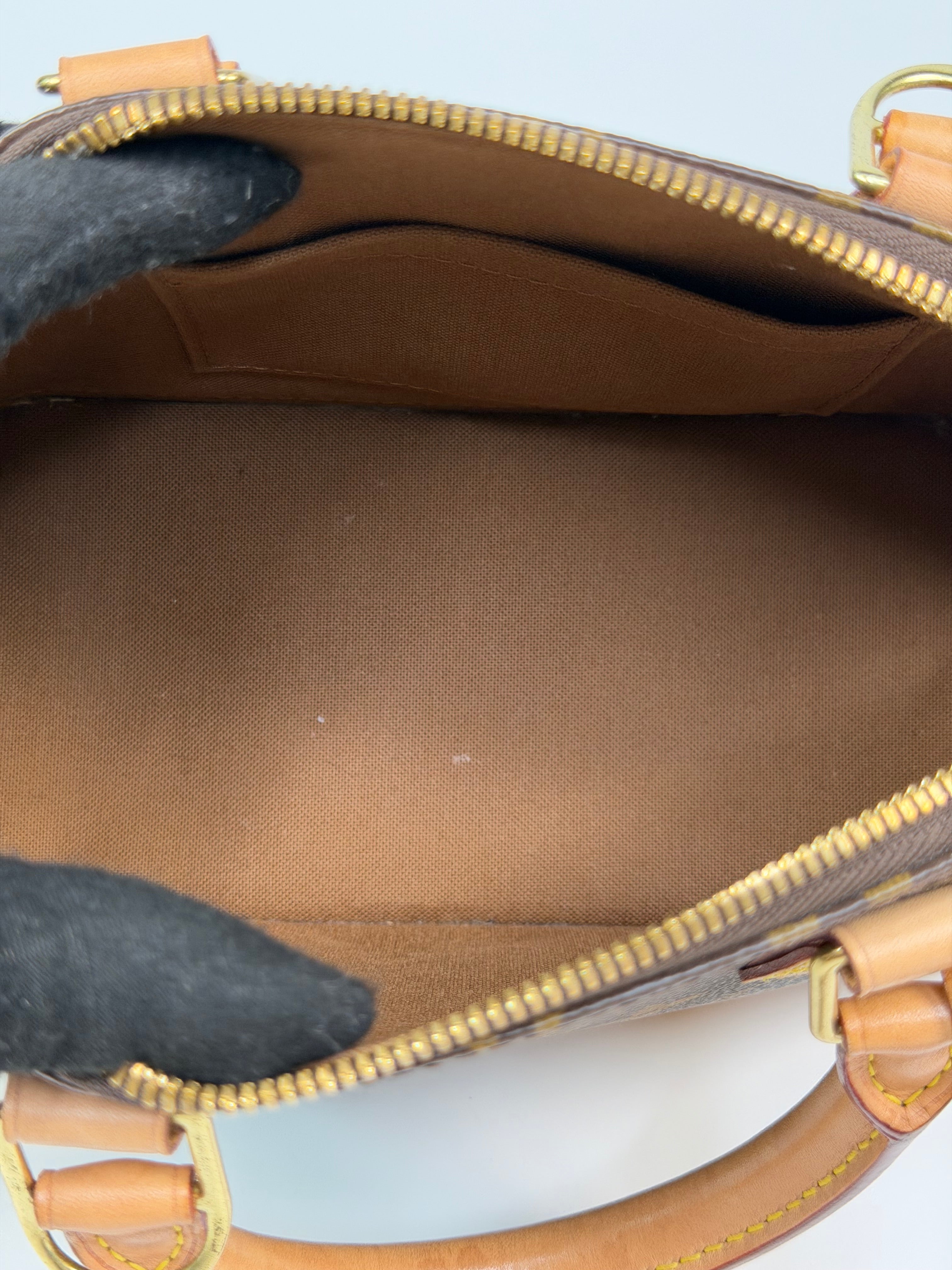 Louis Vuitton Alma BB In Brown Monogram Canvas With Gold Hardware. Authentic and preloved in very good condition