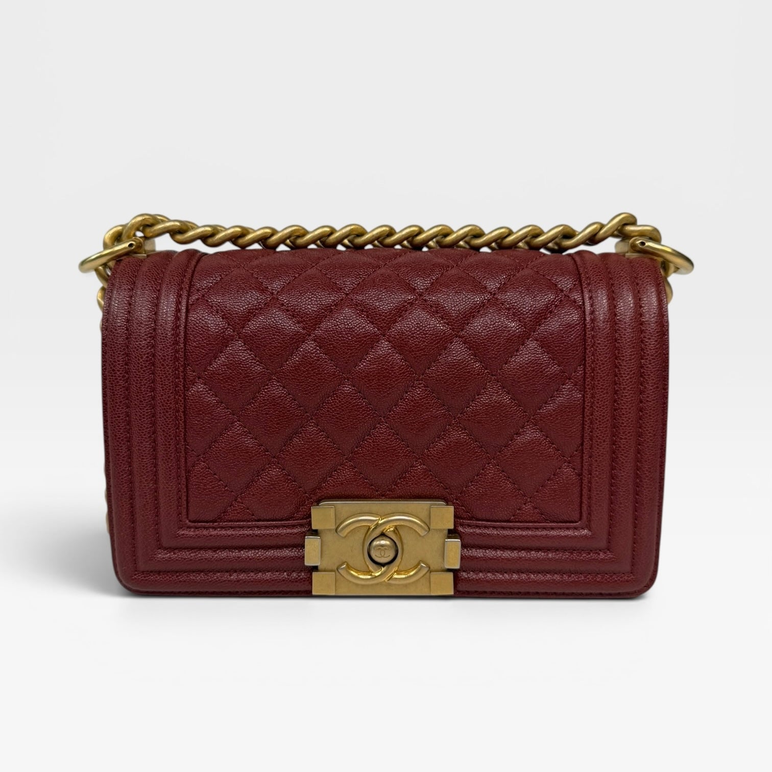 Chanel Le Boy Bag In Burgundy Caviar Leather Gold Hardware. Authentic and preloved in excellent condition.
