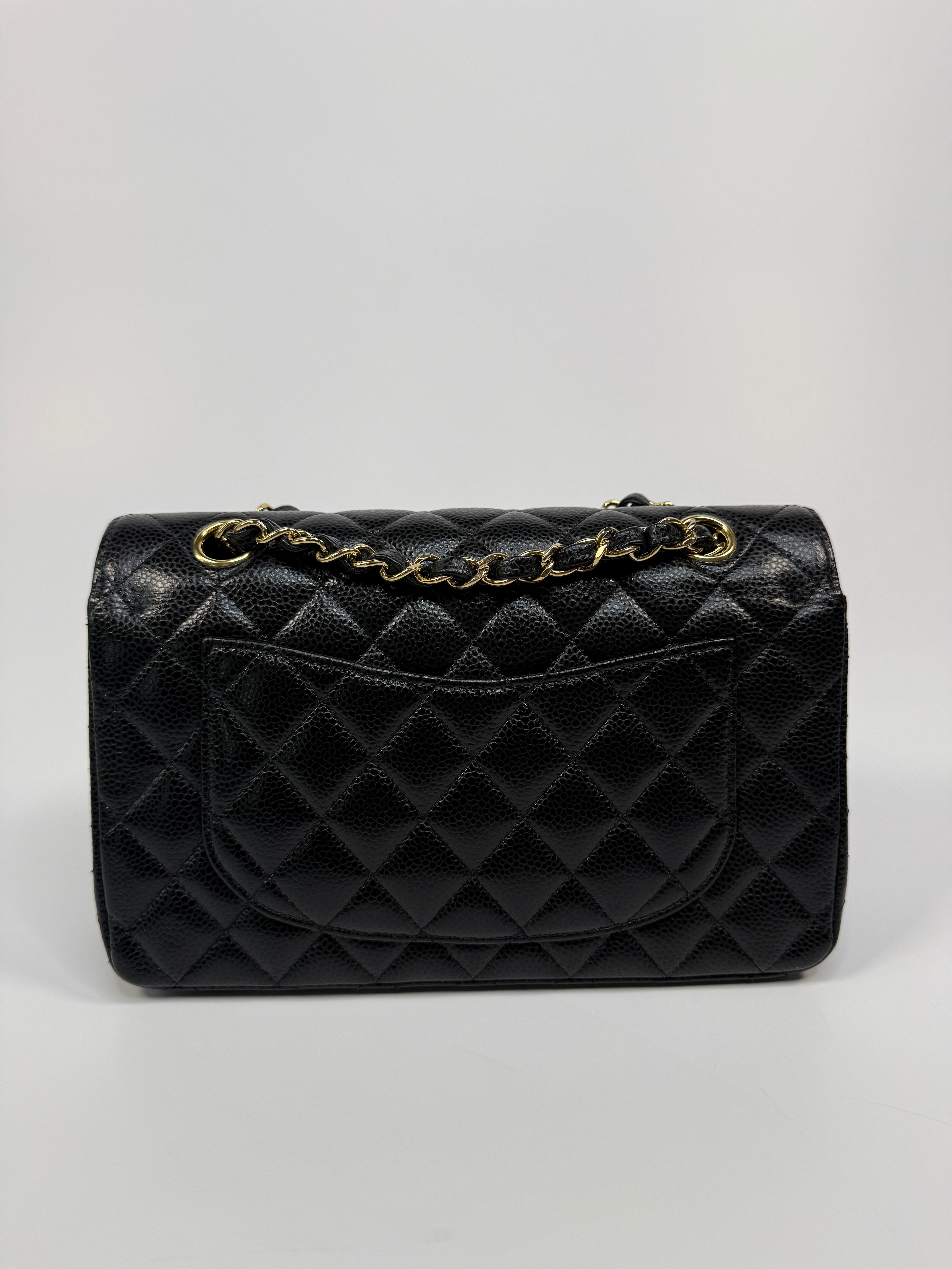 Chanel Small Classic Double Flap In Black Caviar Leather With Gold Hardware
Pre Loved & Authentic