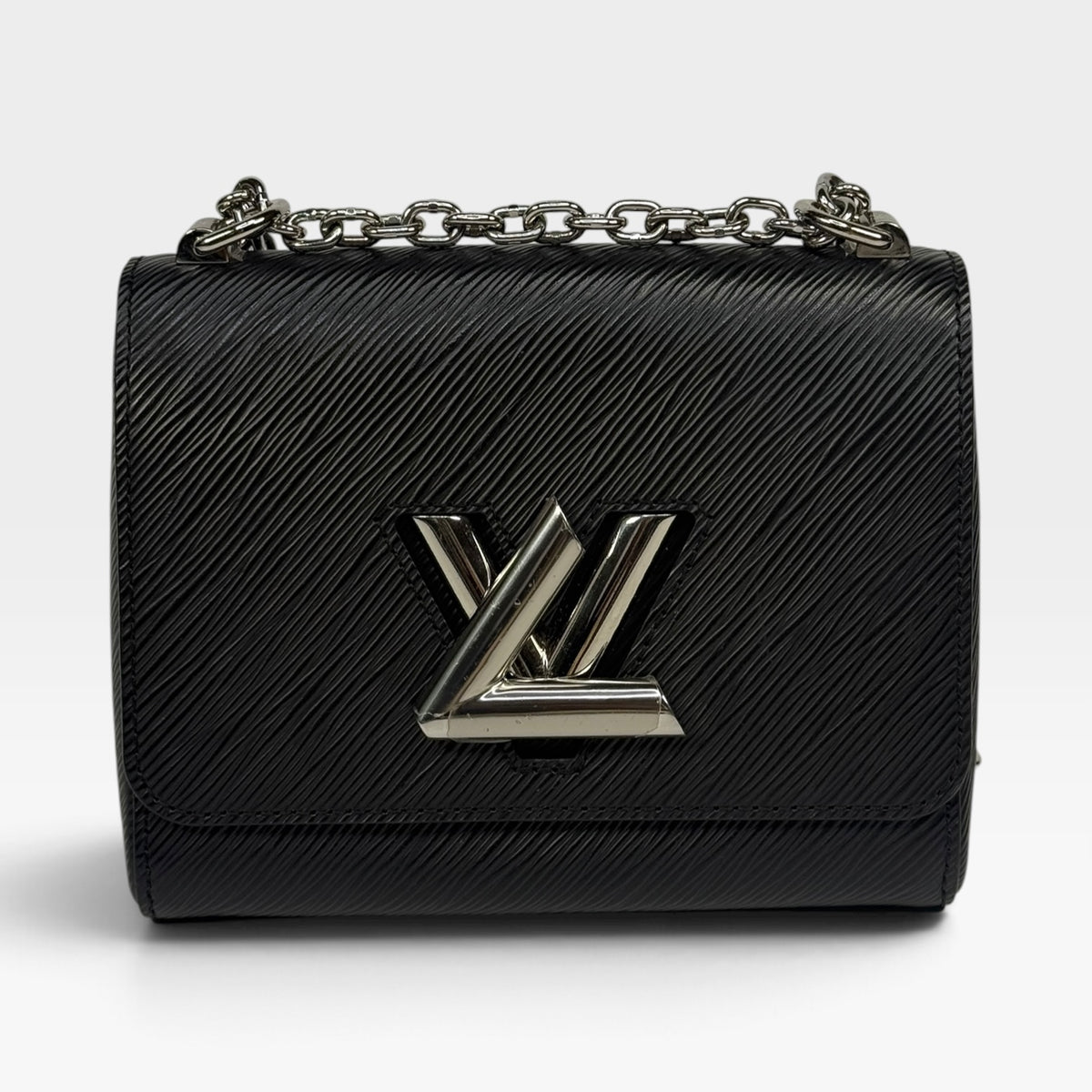 Louis Vuitton Twist PM Shoulder Bag In Black Epi Leather With Silver Hardware. 100% authentic and pre loved in excellent condition.