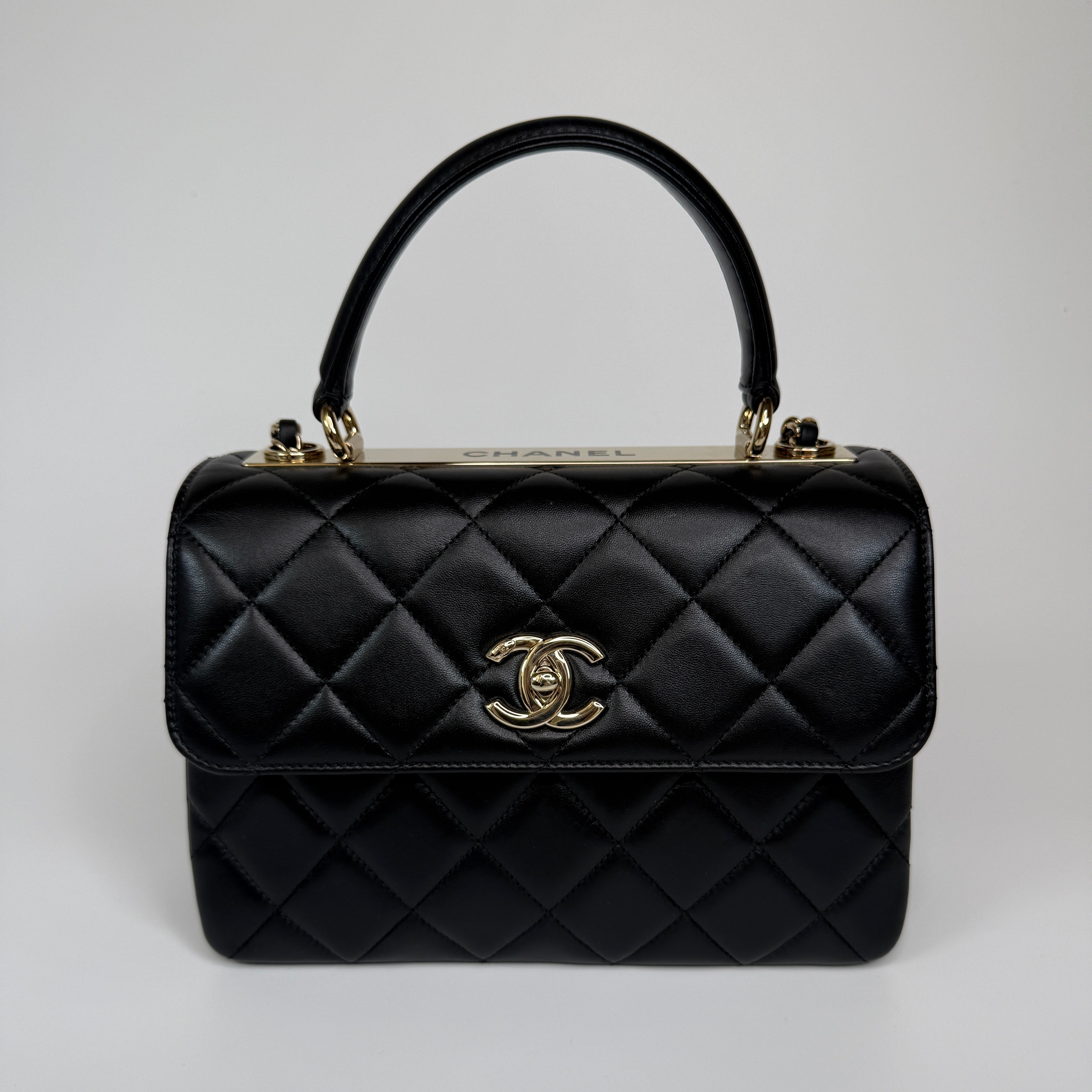 Authentic and preloved Chanel Trendy Top Handle Flap Bag In Black Lambskin With Gold Hardware. Excellent condition. 100% Authenticity guarantee