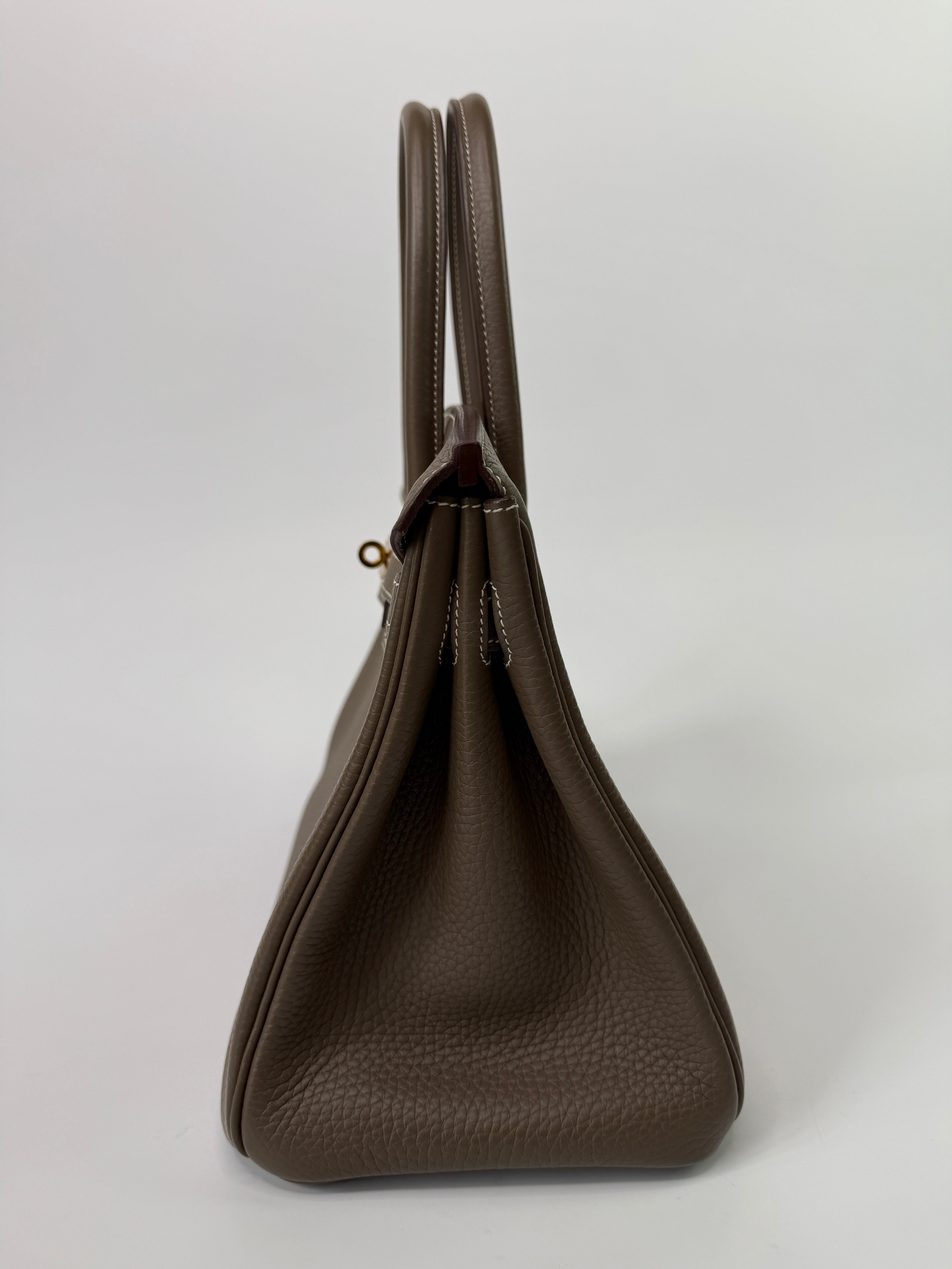 Authentic pre-loved Hermès Birkin 30 In Etoupe Togo Leather With Gold Hardware.