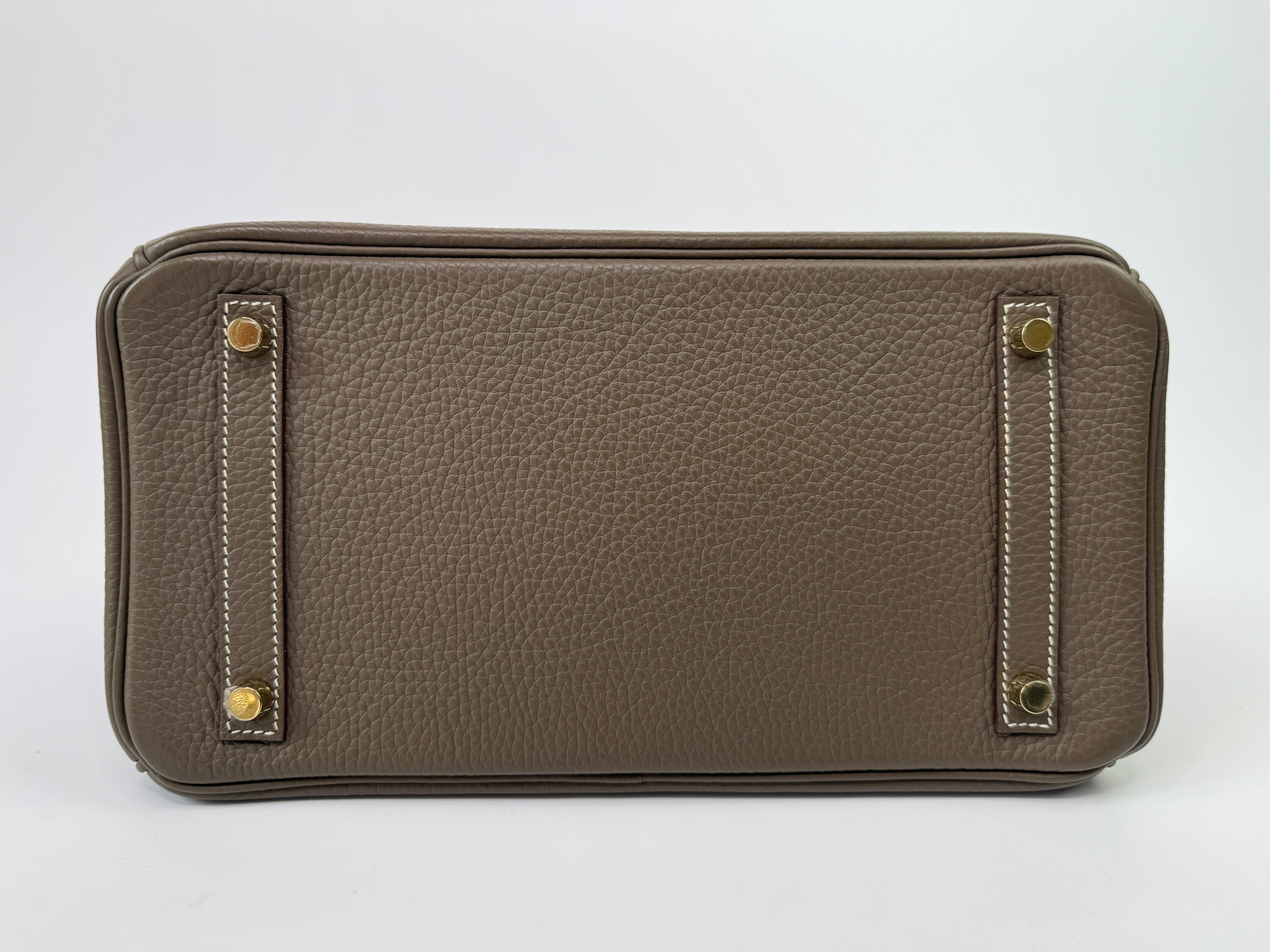 Authentic pre-loved Hermès Birkin 30 In Etoupe Togo Leather With Gold Hardware.