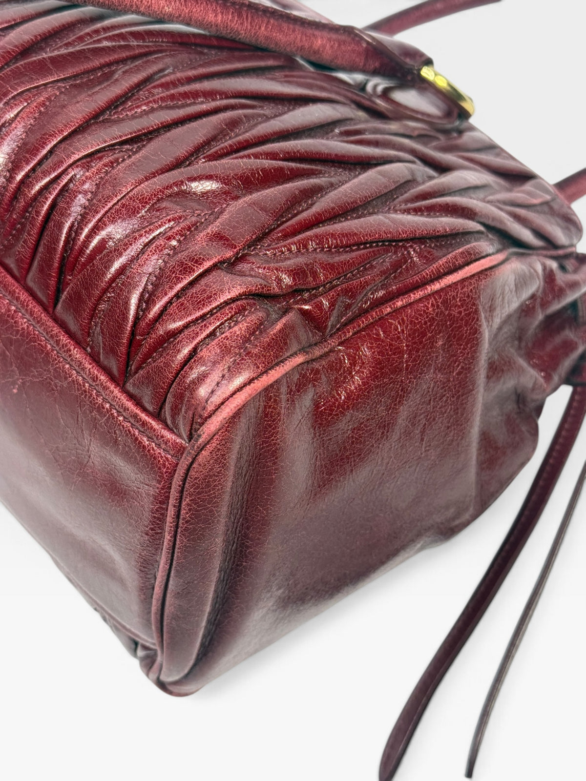Miu Miu Bauletto Tote Bag In Burgundy Matelasse Leather With Gold Hardware. 100% authentic and pre loved in excellent condition.