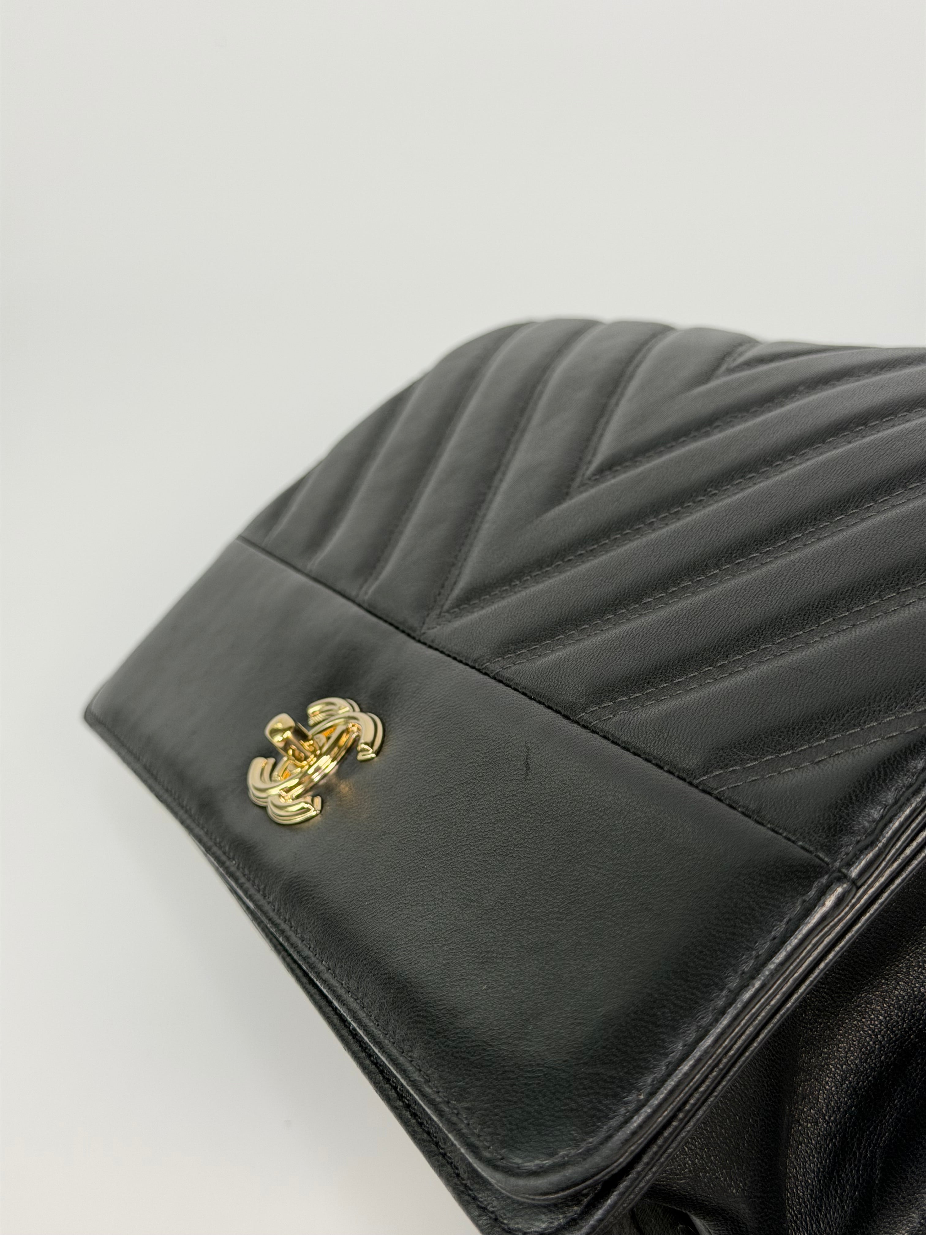 Chanel Chevron Flap In Black Lambskin Leather With Gold Hardware. Authentic and preloved in excellent condition. 100% guarantee