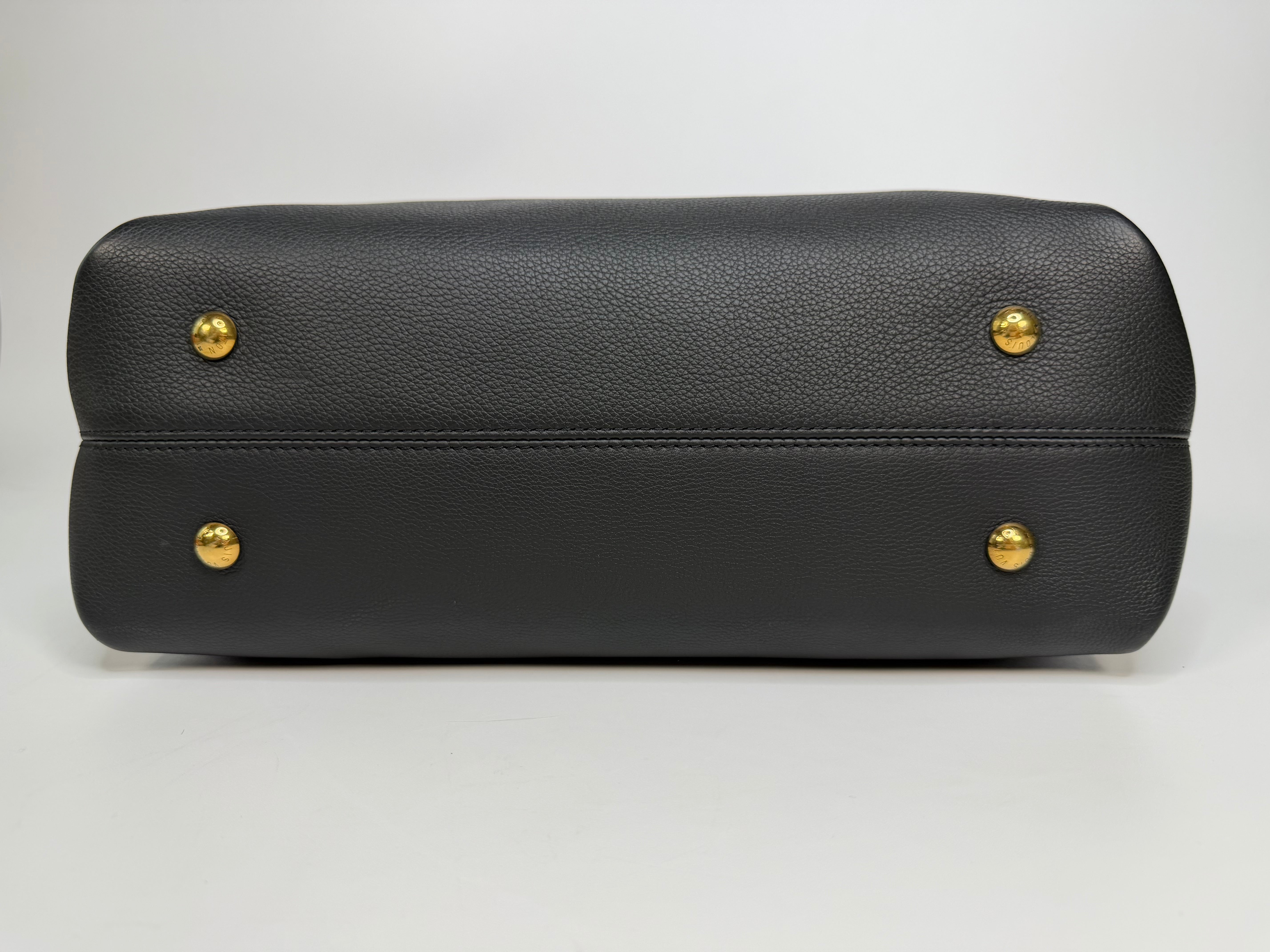 Louis Vuitton Low Key Cabas MM In Black Calfskin With Gold Hardware. Authentic and preloved in excellent condition