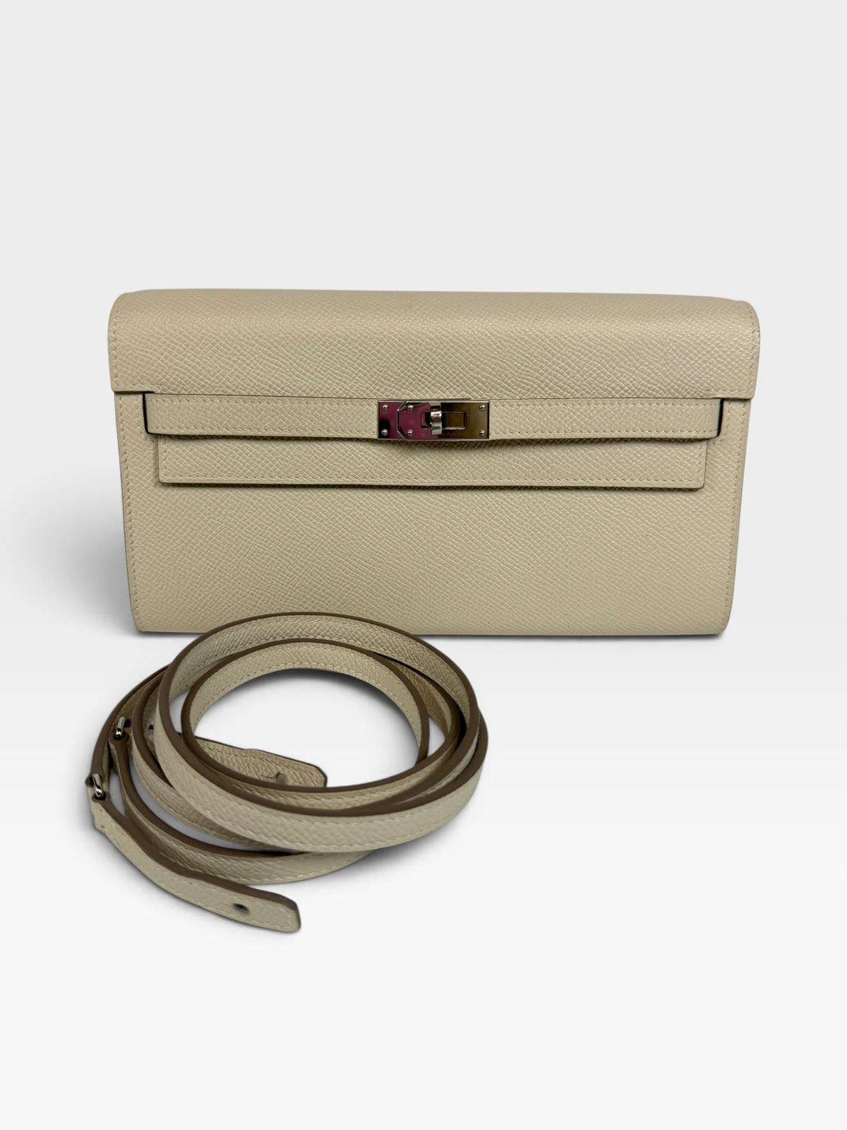 Hermès Kelly To Go In Craie Epsom Leather With Palladium Hardware. Authentic and preloved in excellent condition. 100% guarantee