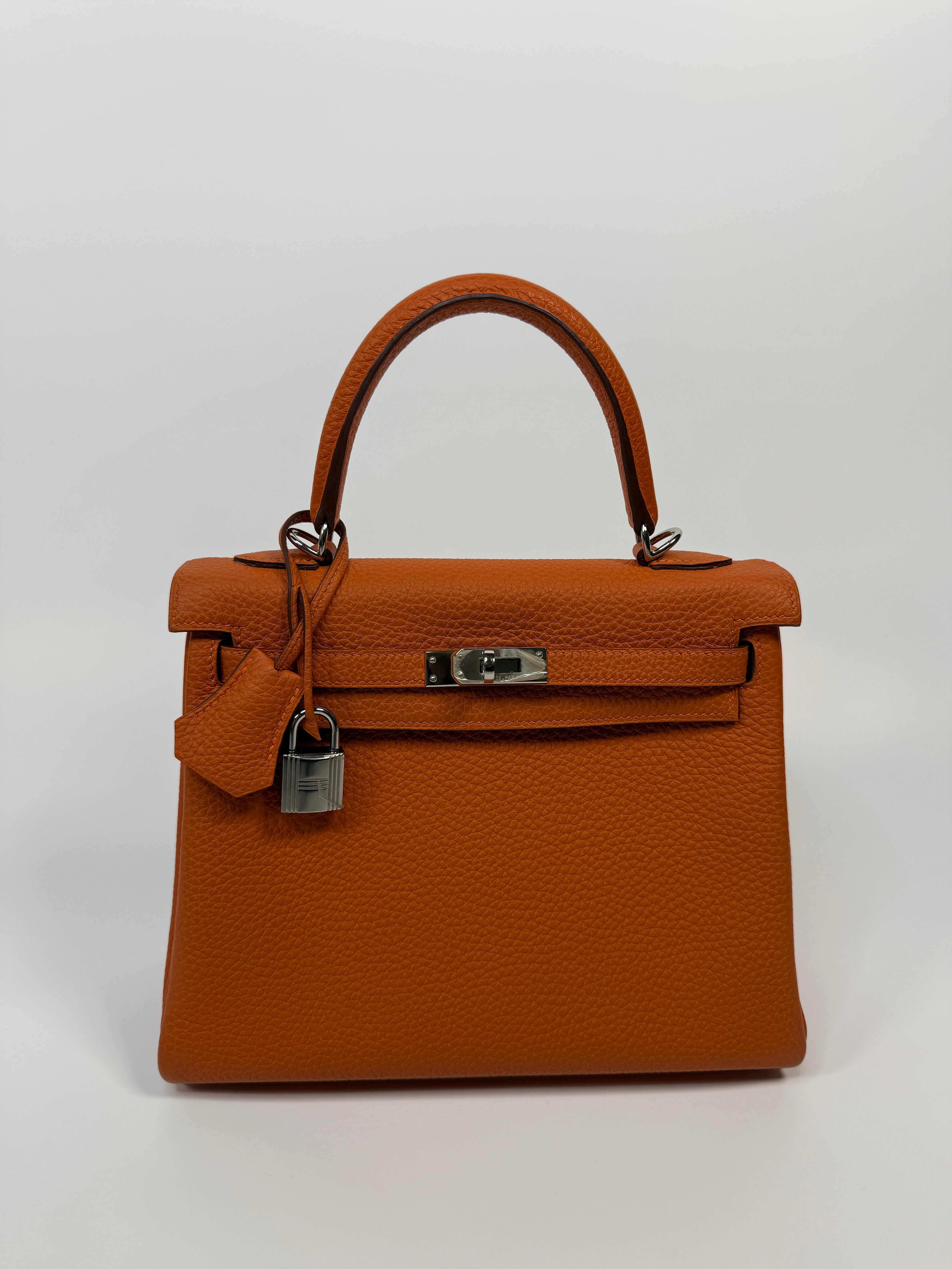 Authentic Pre Loved Hermès Kelly 25 In Orange Togo Leather With Palladium Hardware Excellent Condition