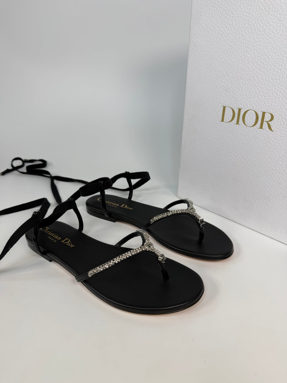 Dior Paris Crystal T-Bar Thong Sandals In Black Calfskin Size ( 36/UK3) Authentic and preloved in excellent condition. Insured next day delivery. Verified by Luxe Cheshire
