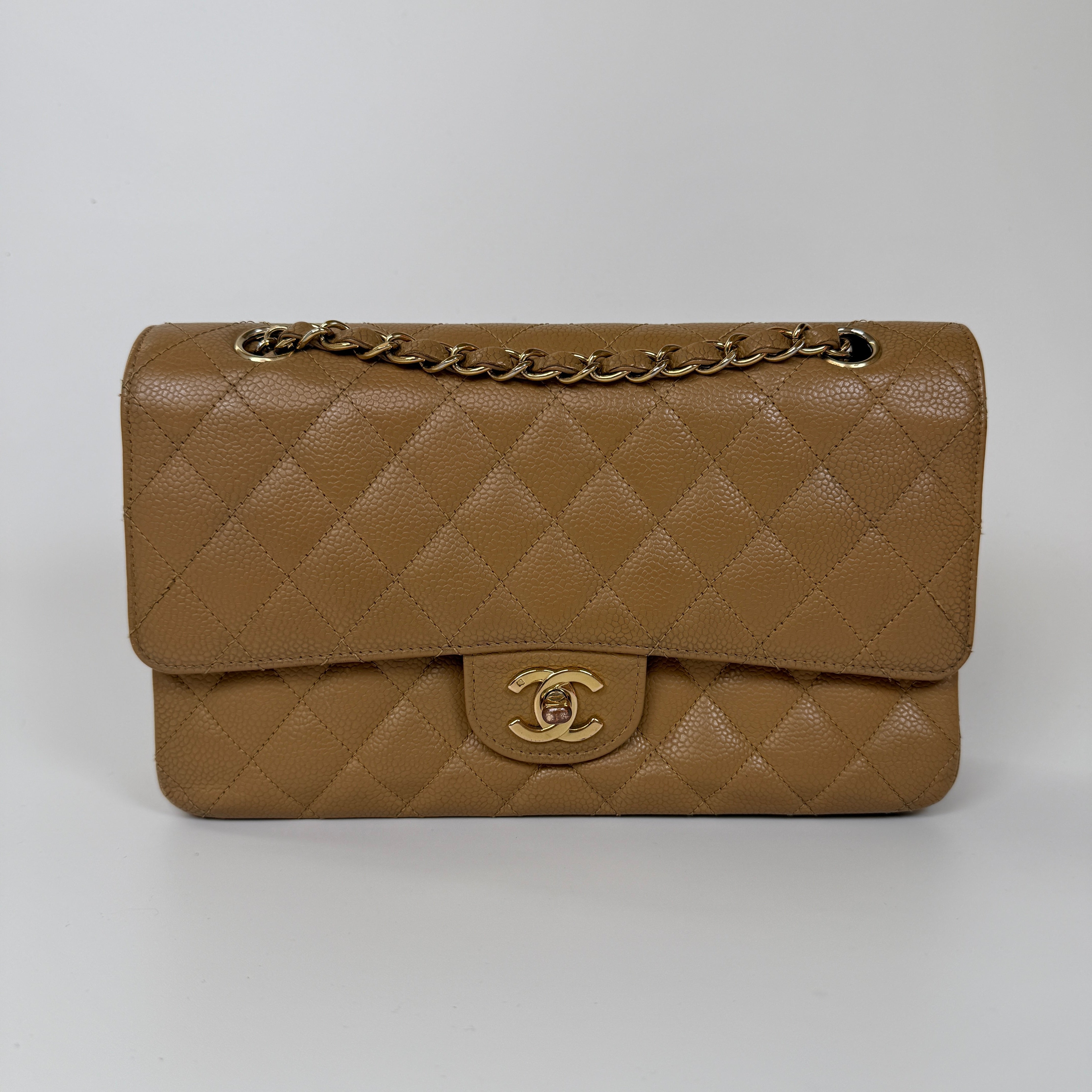 Authentic and preloved Chanel Vintage Medium Classic Double Flap In Camel Caviar Leather With 24kt Gold Plated Hardware. 100% Authenticity Guarantee 