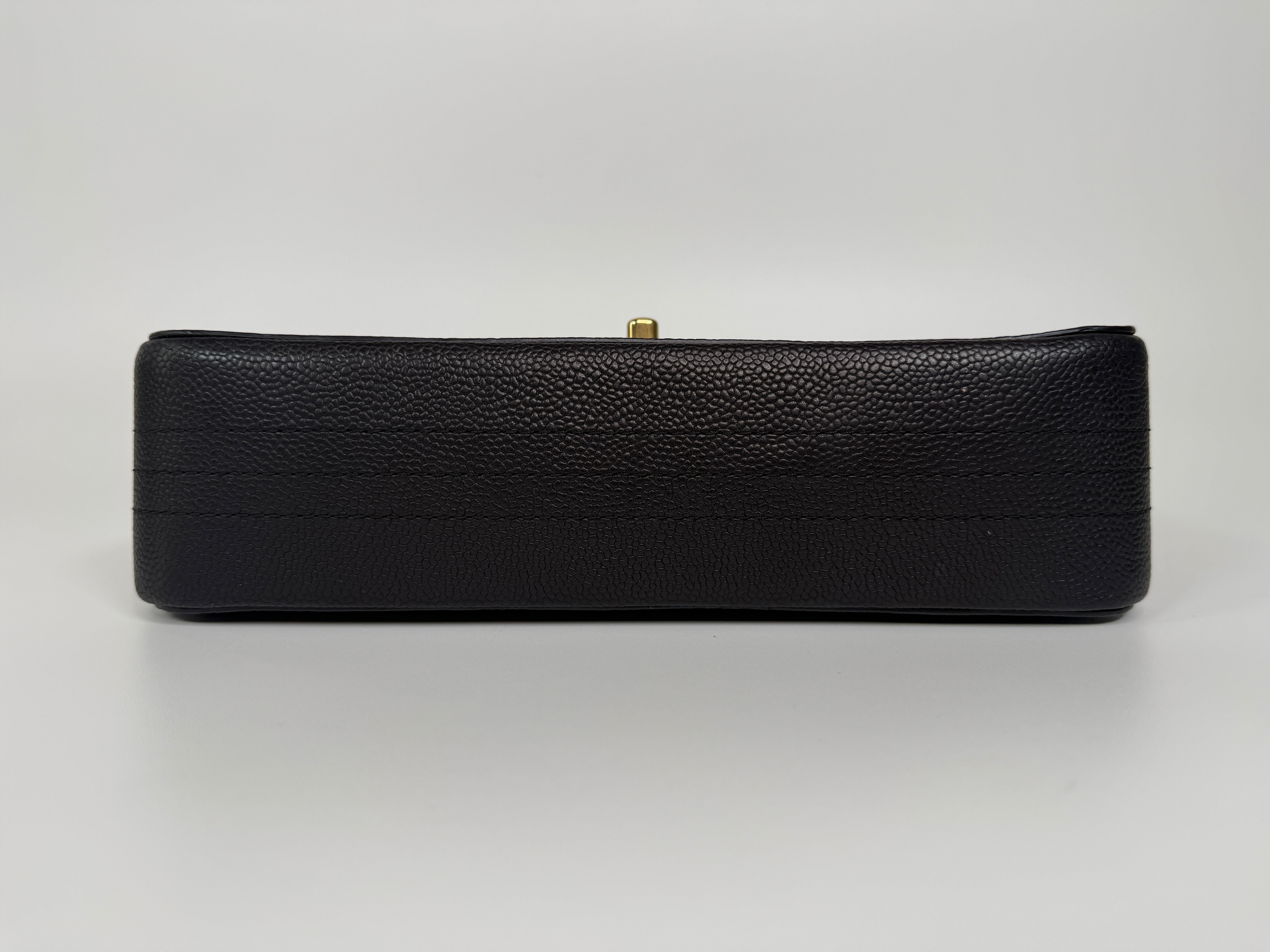 Authentic and preloved Chanel Medium Pure Timeless Flap Black In Black Caviar Leather With Gold Hardware. 100% Authenticity Guarantee 