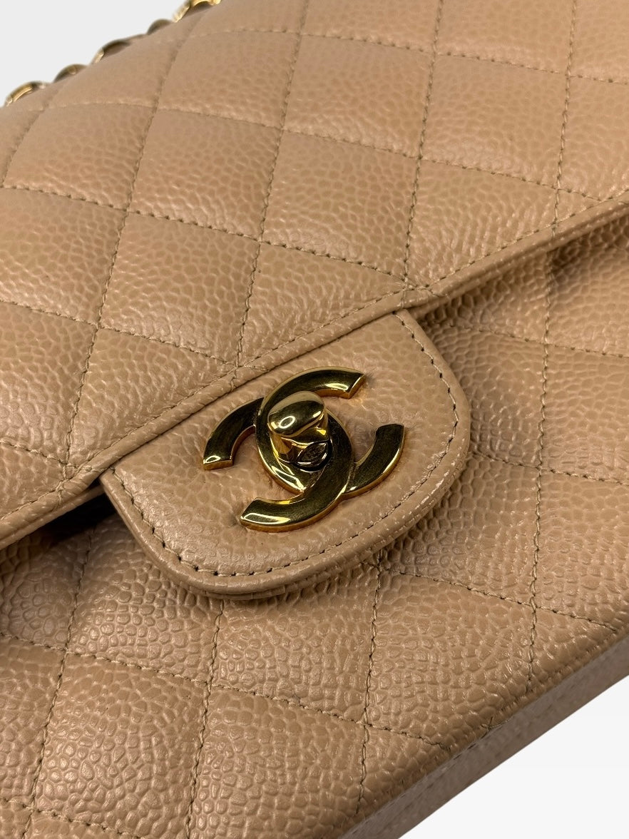 Chanel Medium Classic Flap In Beige Caviar Leather With Gold Hardware. 100% authentic and preloved in excellent condition