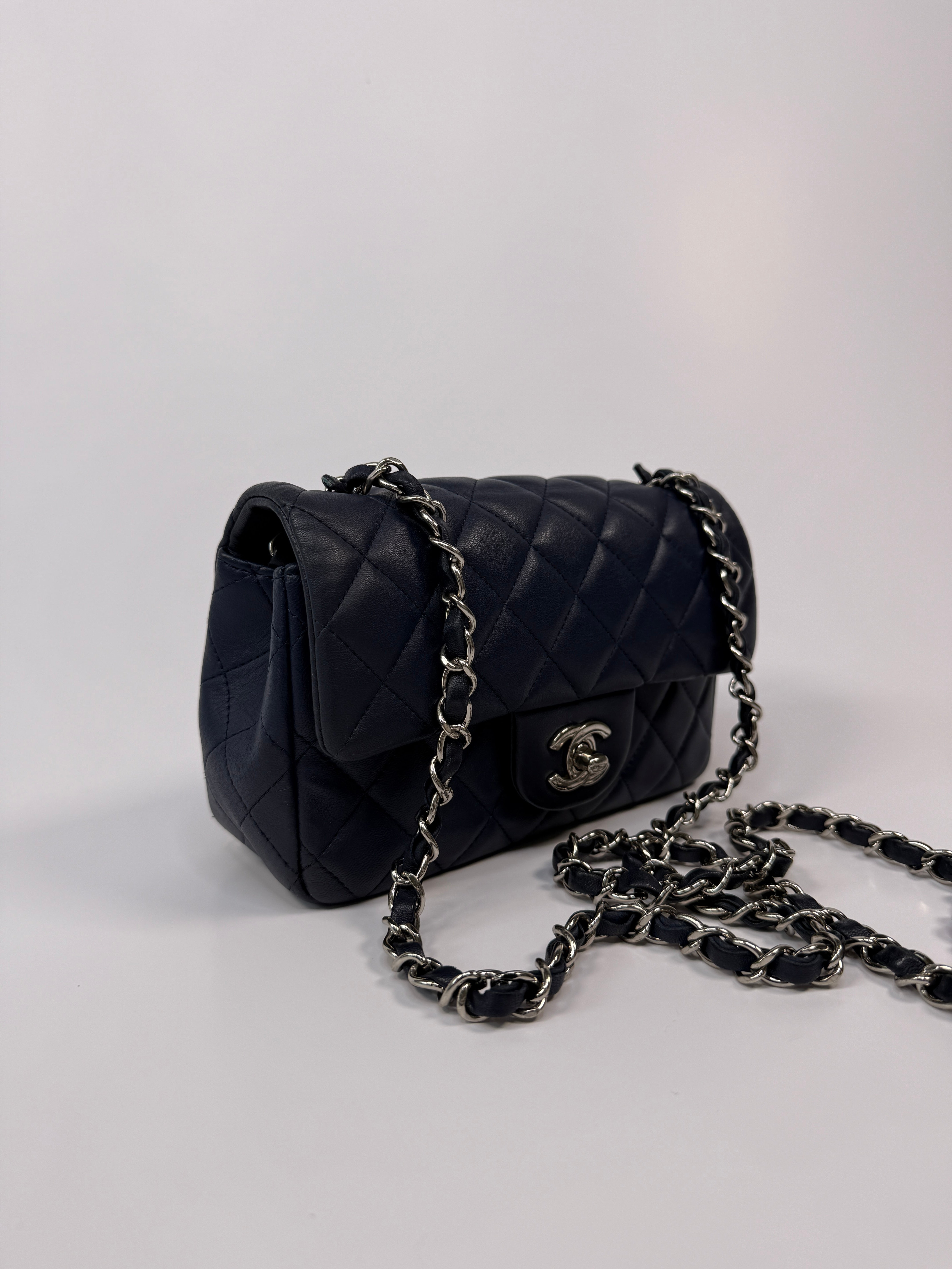Chanel Mini Rectangle Flap Bag In Navy Lambskin With Silver Hardware
Pre Loved & Authentic 