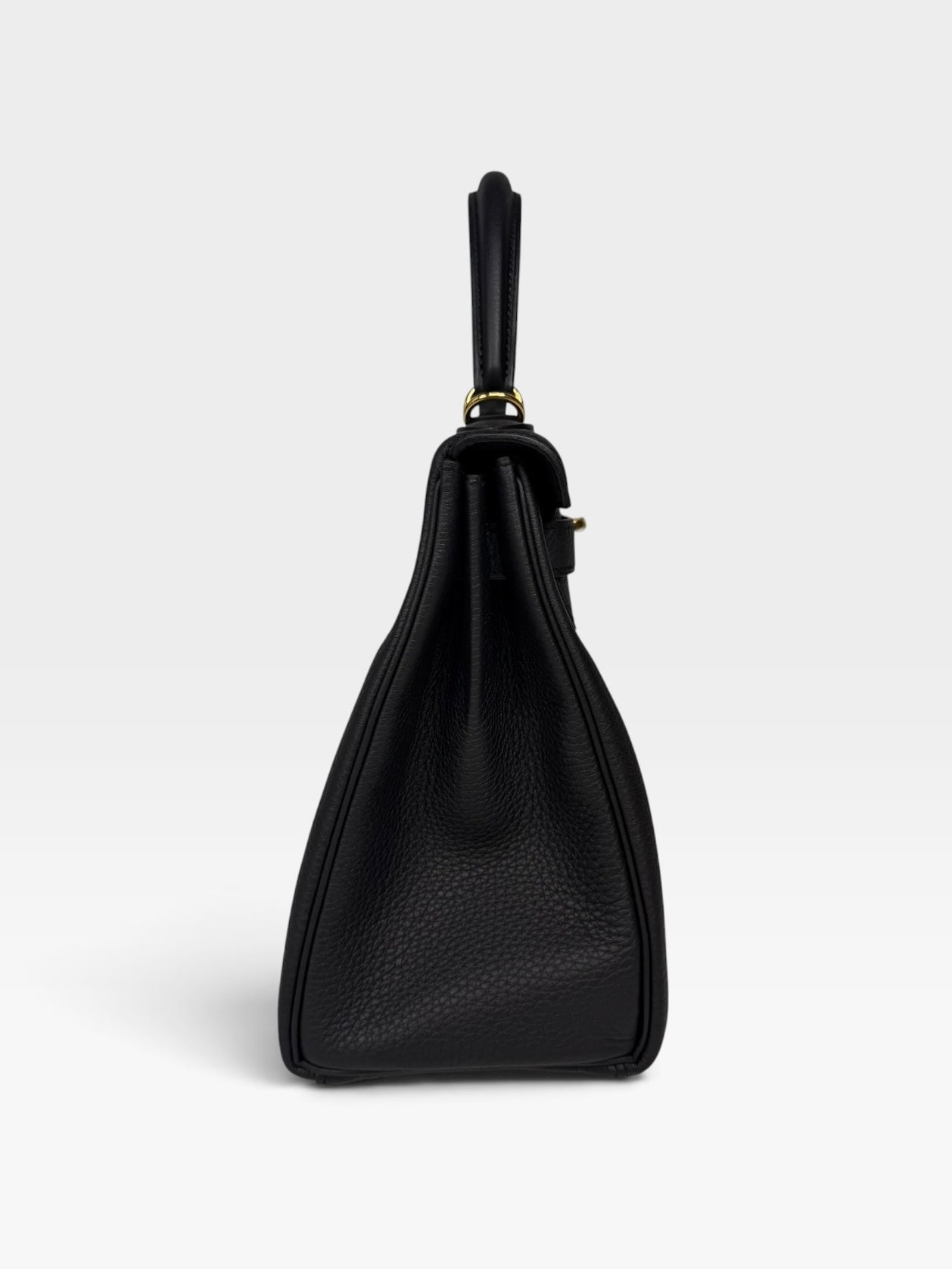 Authentic pre-loved Hermès Kelly 28 In Black Togo Leather Gold Hardware. New and Unused condition, verified by Luxe Cheshire. Trusted designer resale.